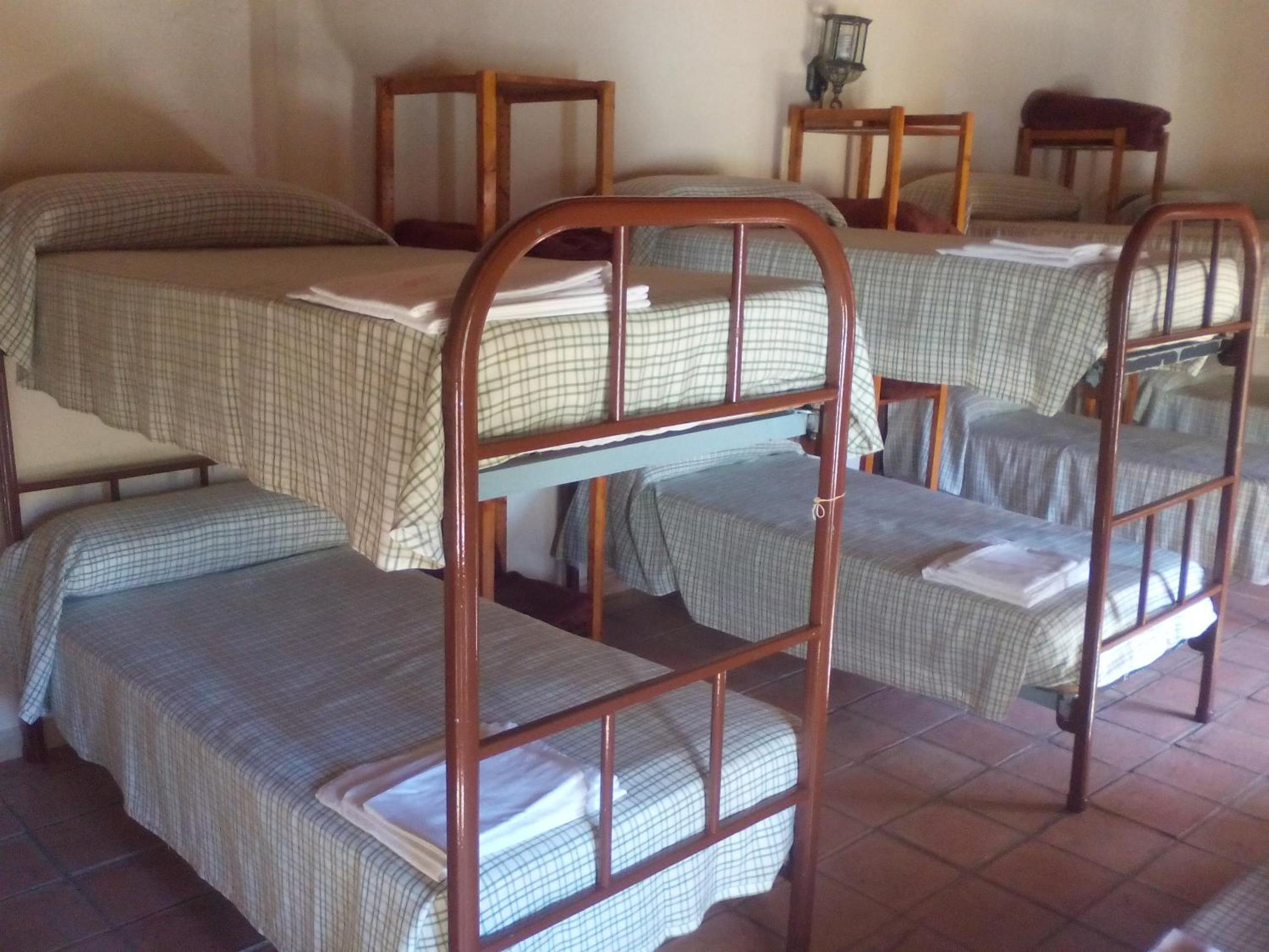 Cama individual en habitación compartida