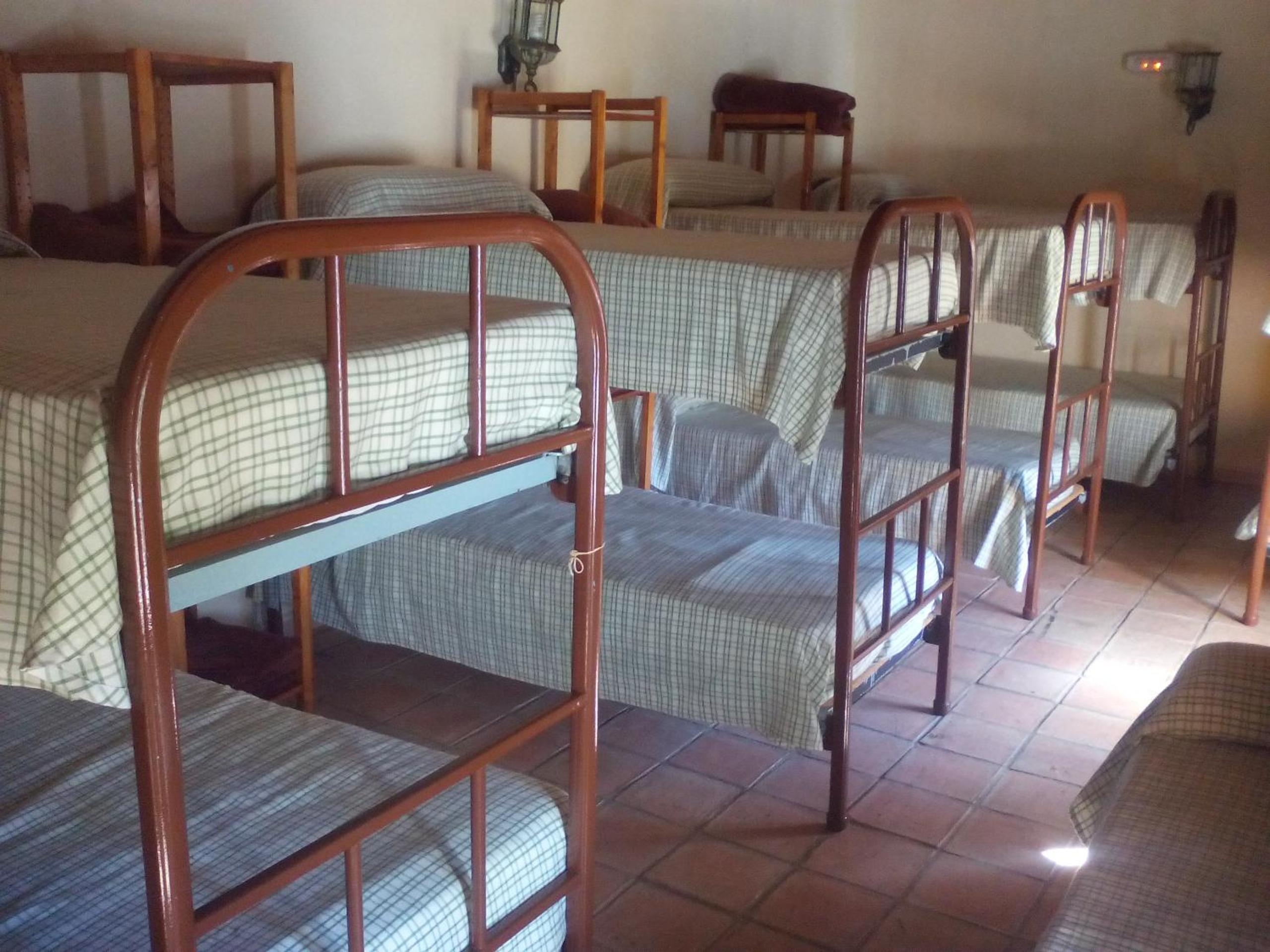 Cama individual en habitación compartida mixta