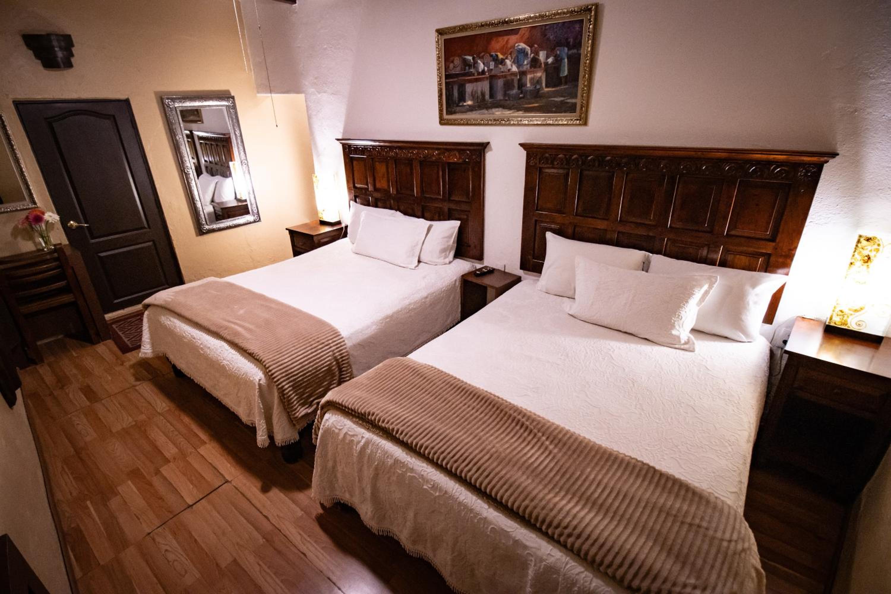 Standard Queen Room with Two Queen Beds photo 1