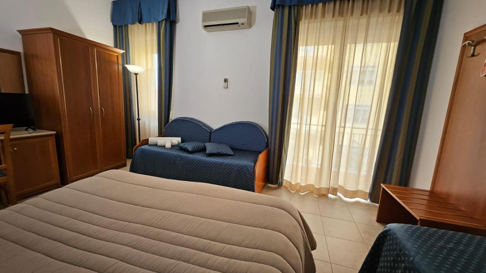 Quadruple Room with Balcony
