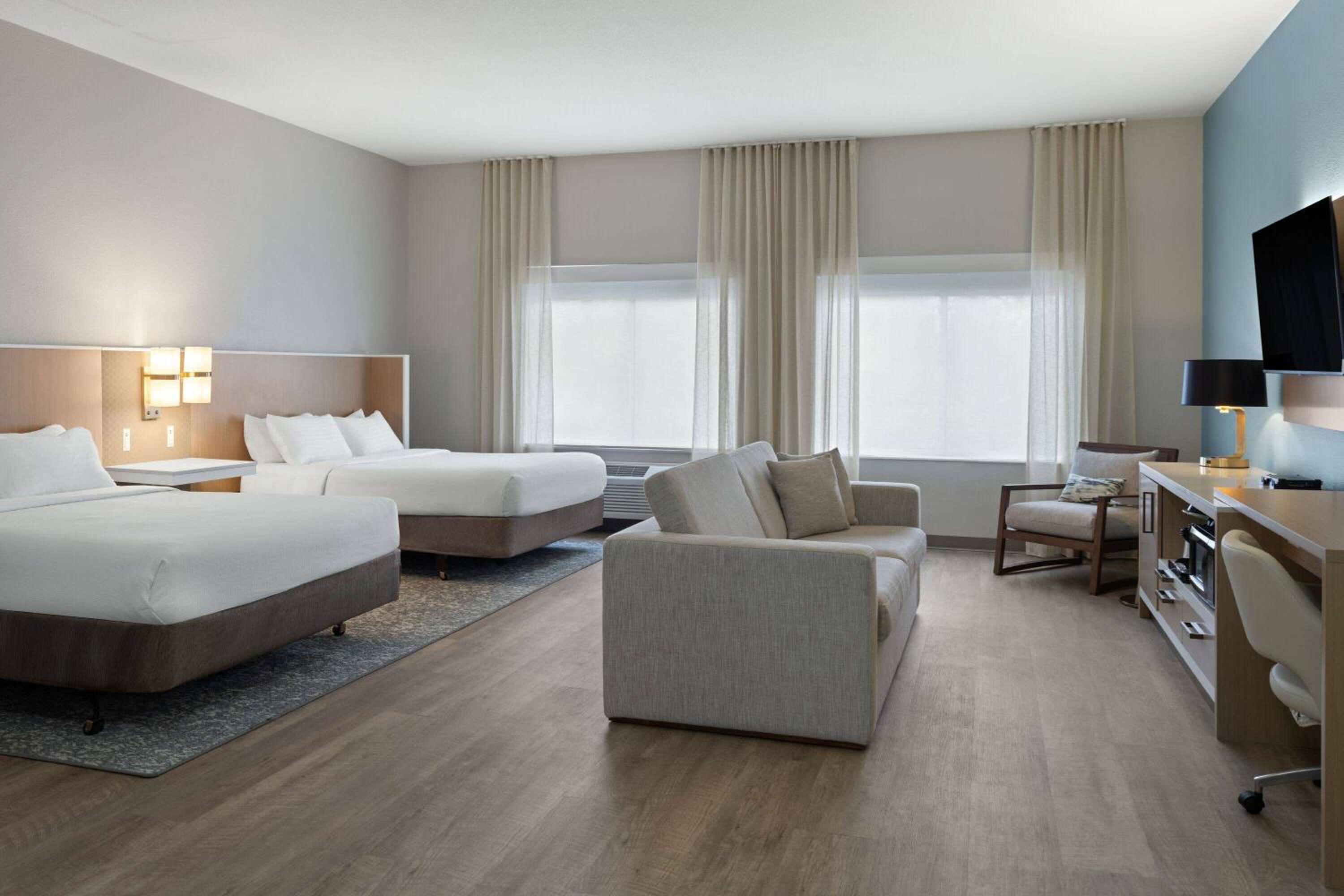 Queen Room with Two Queen Beds and Bath Tub - Mobility Accessible/Non-Smoking - Photo 1