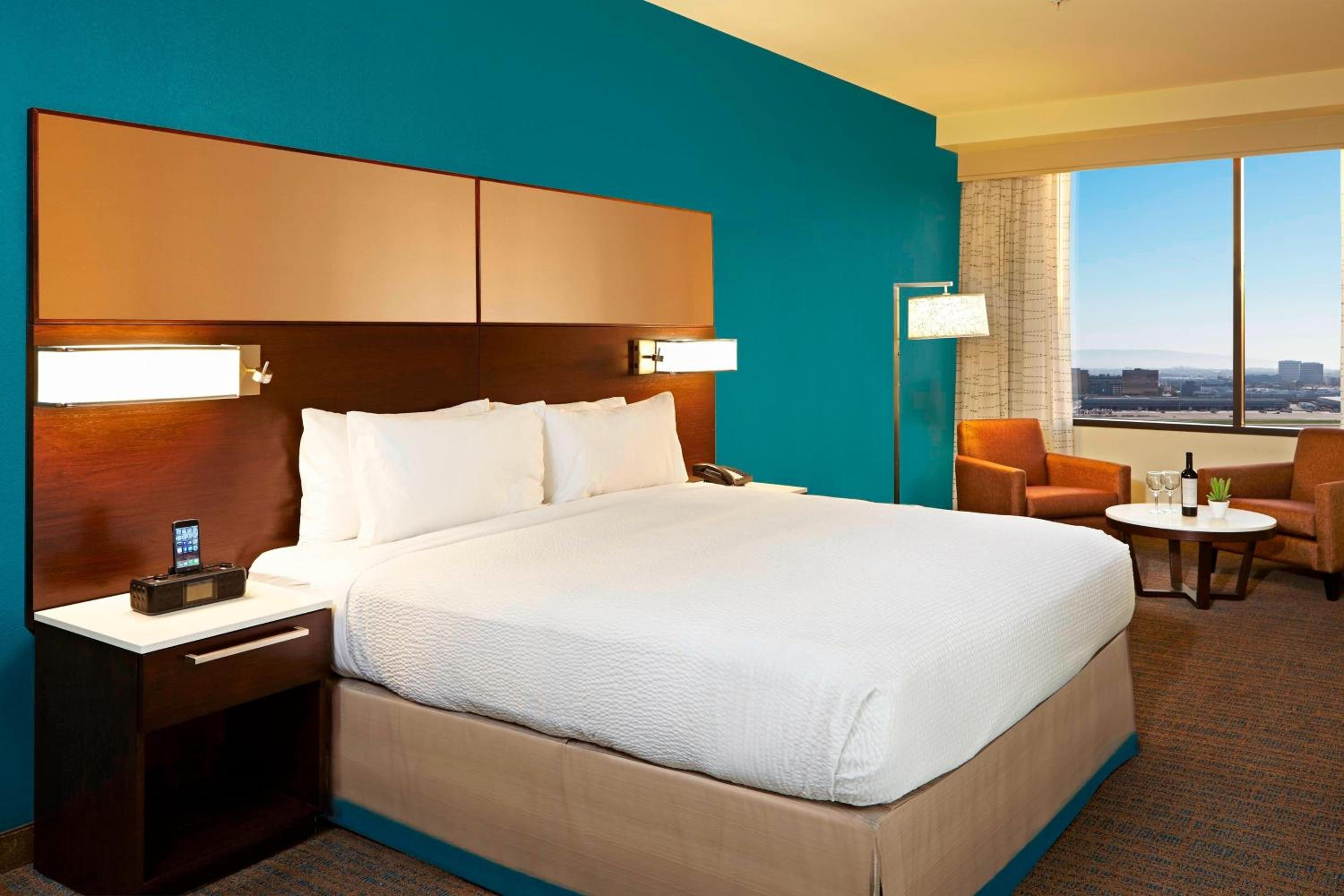 One-Bedroom King Suite with Sofa Bed and Roll-in Shower - Mobility and Hearing Accessible