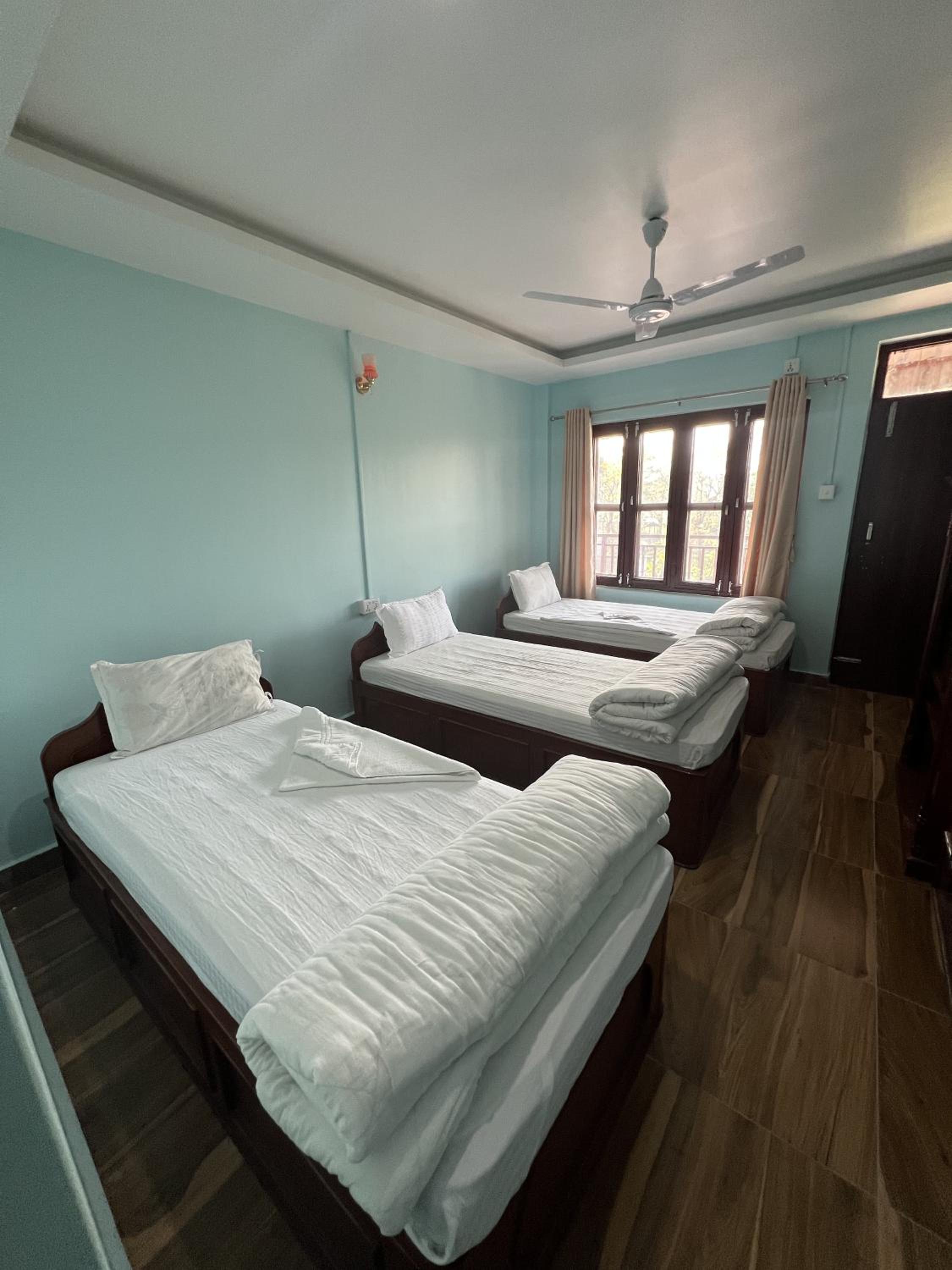 Triple Room with Garden View photo 2