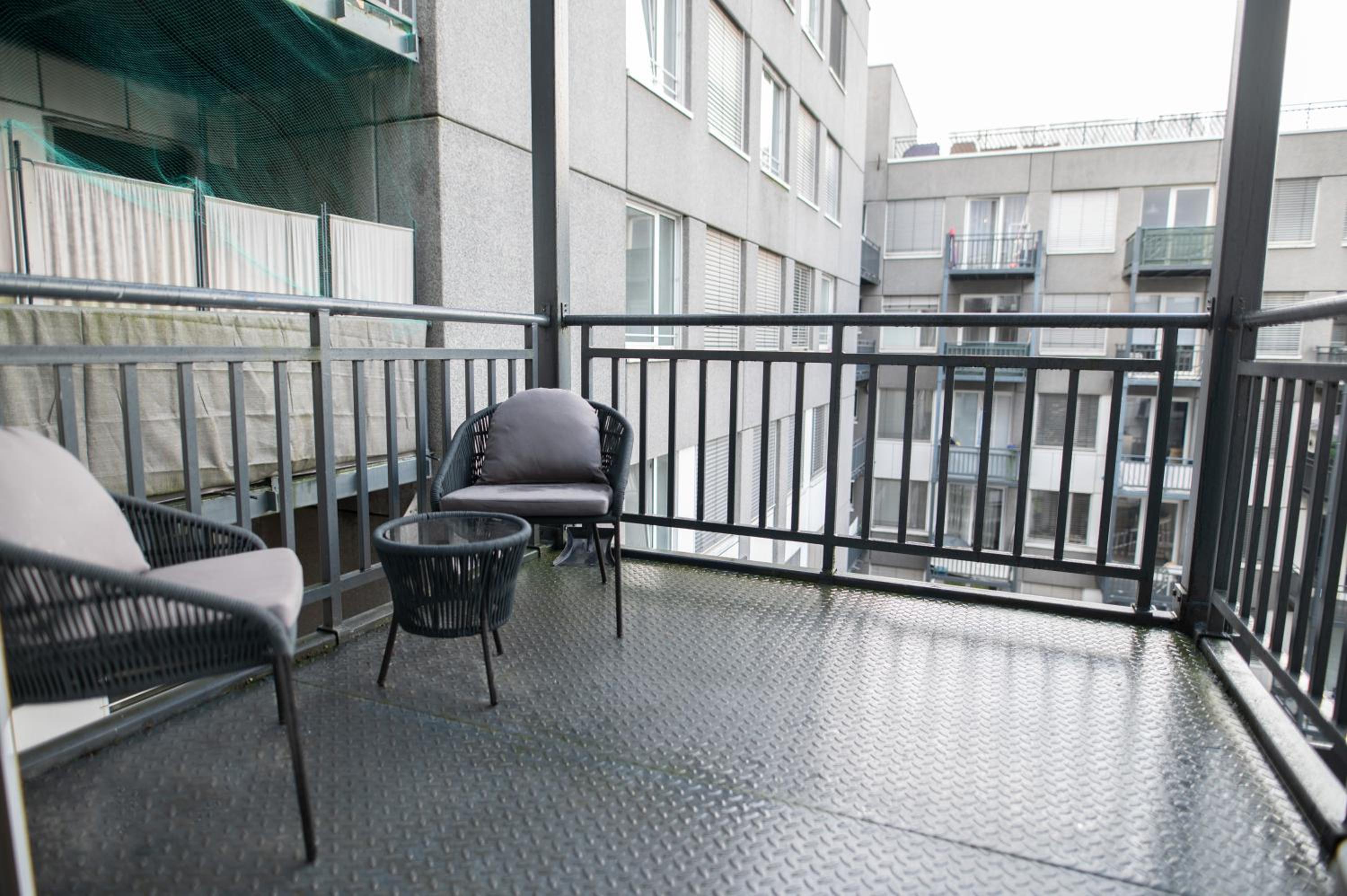 Three-Bedroom Apartment with Balcony