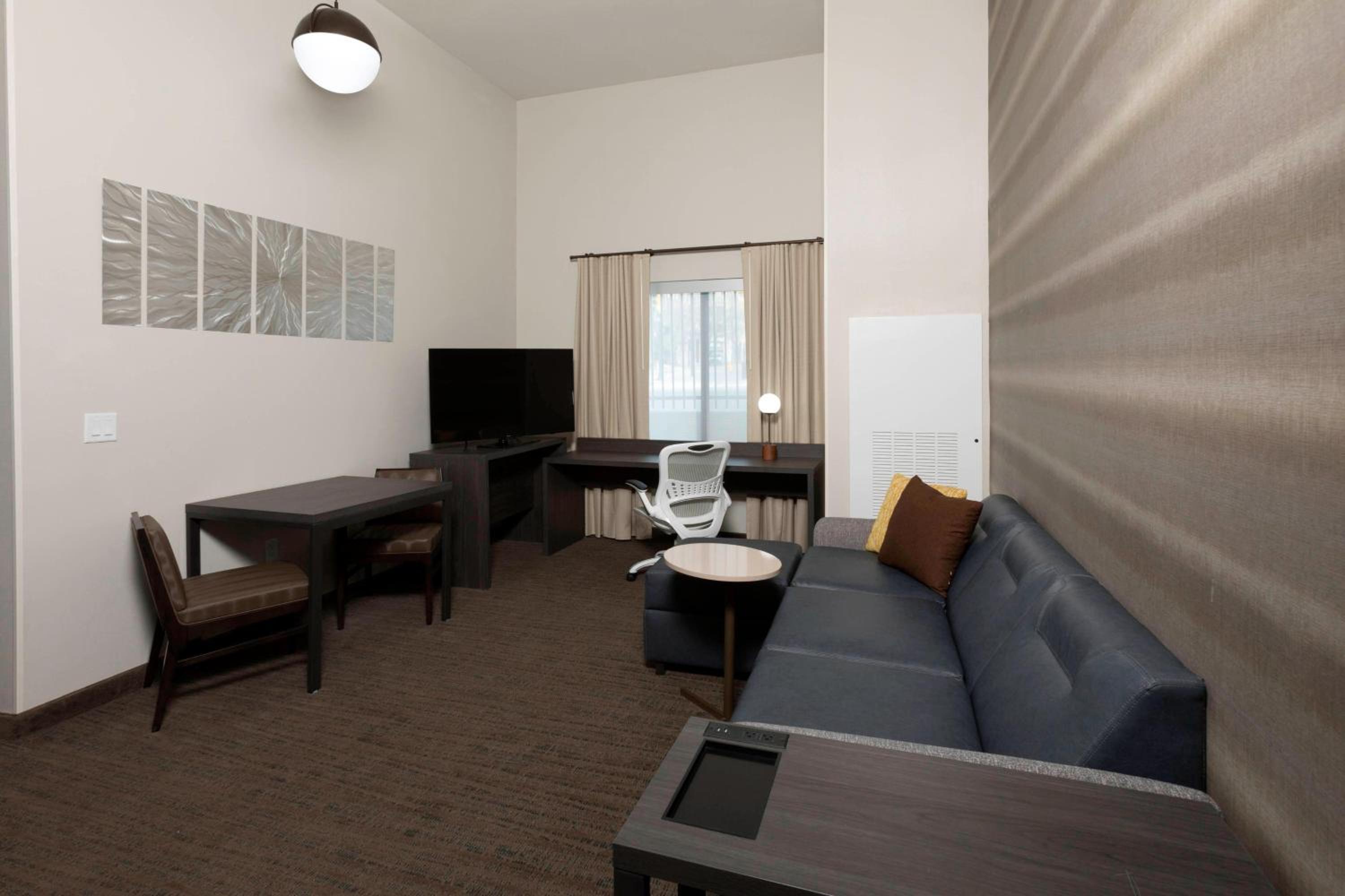 One-Bedroom King Suite with Sofa Bed and City View - Hearing Accessible photo 1