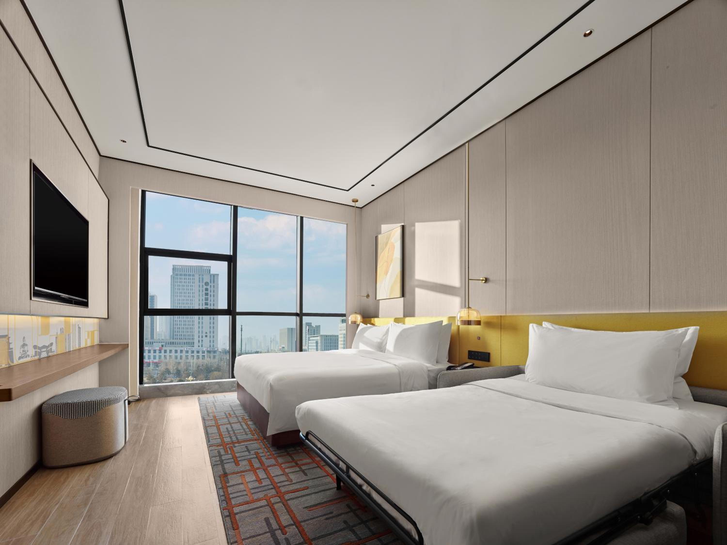 Deluxe King Room with Sofa Bed photo 2