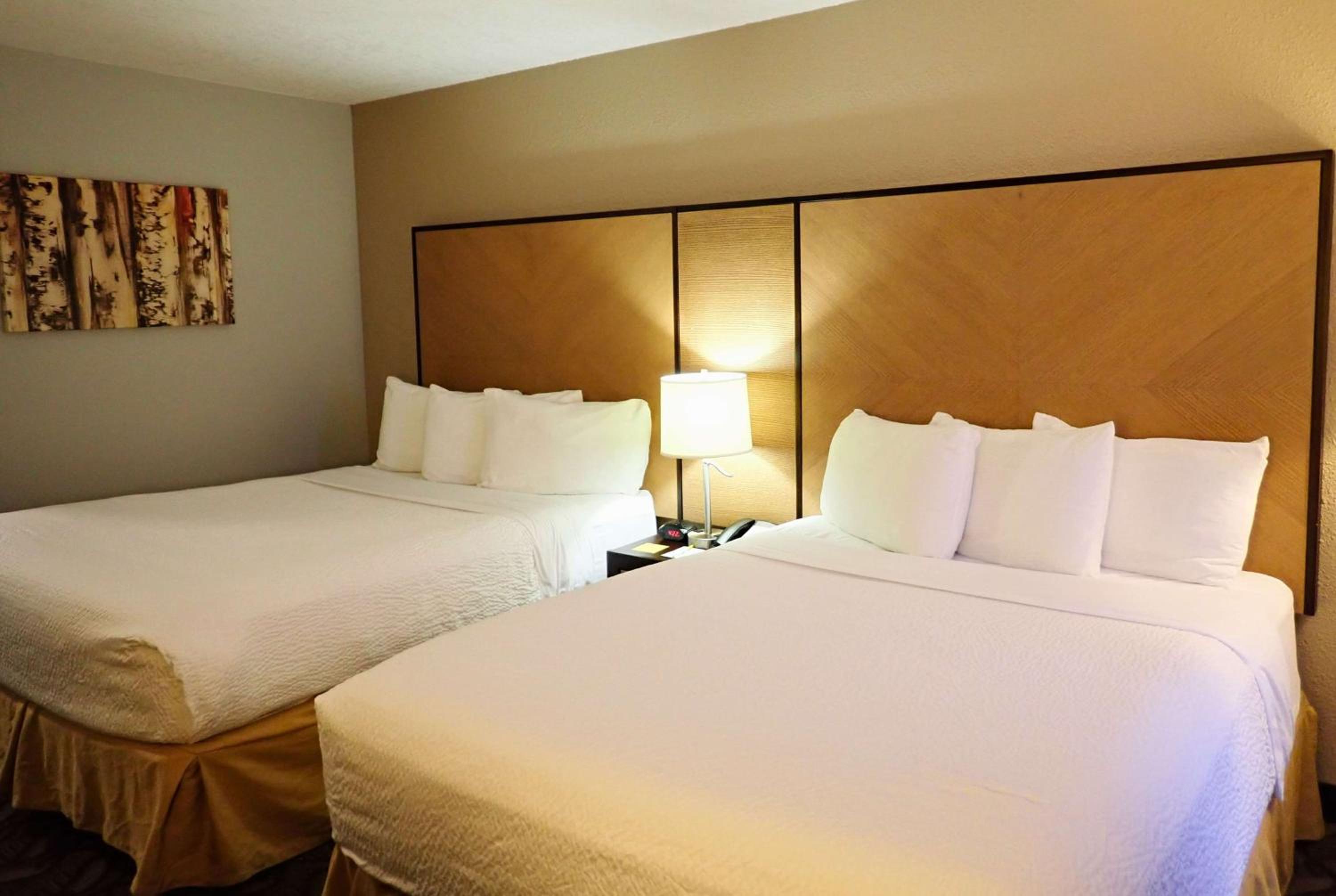 Queen Room with Two Queen Beds and Balcony - Non-Smoking photo 1