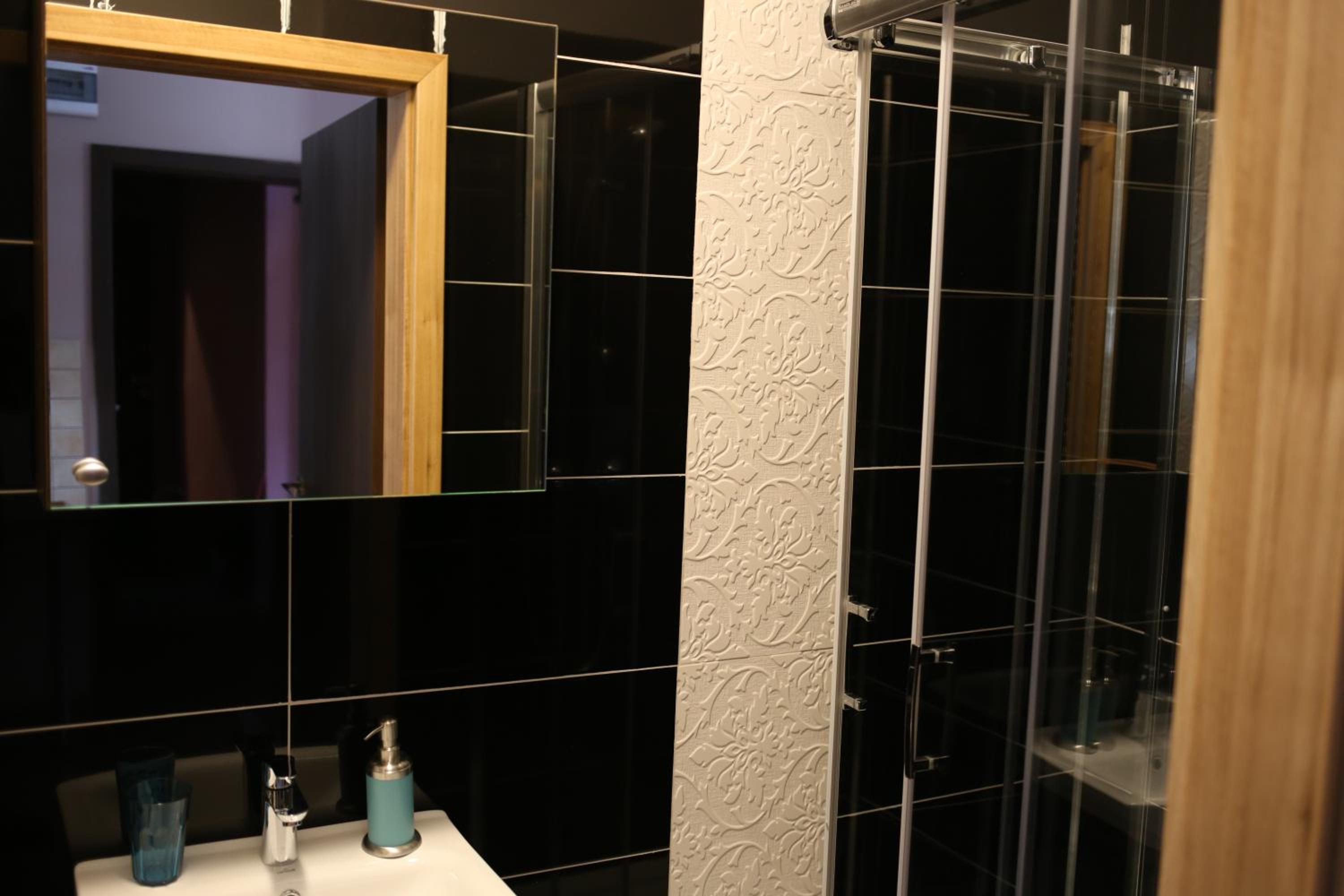Deluxe Triple Room - Photo 8