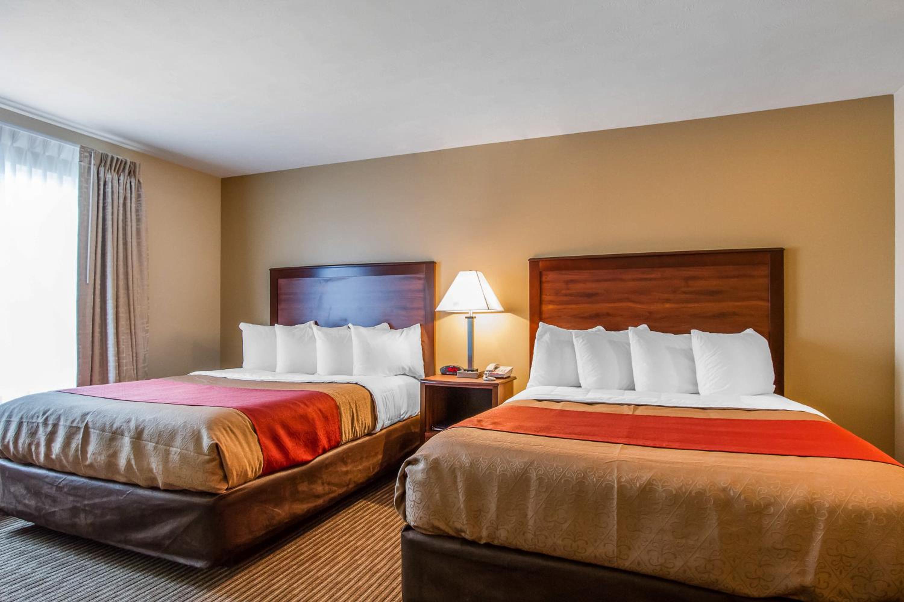 Queen Suite with Two Queen Beds and Sofa Bed - Non-Smoking photo 1