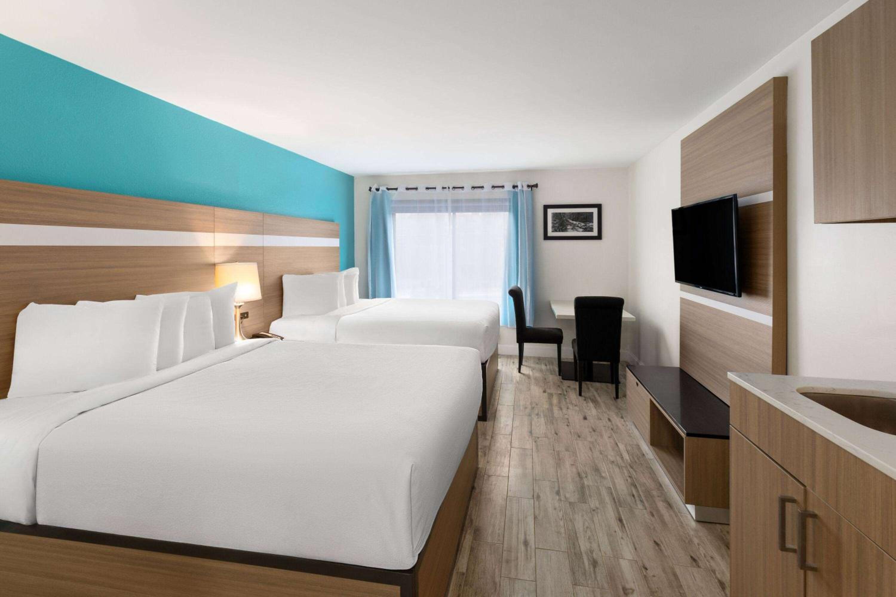 Queen Room with Two Queen Beds and Kitchenette - Non-Smoking photo 1