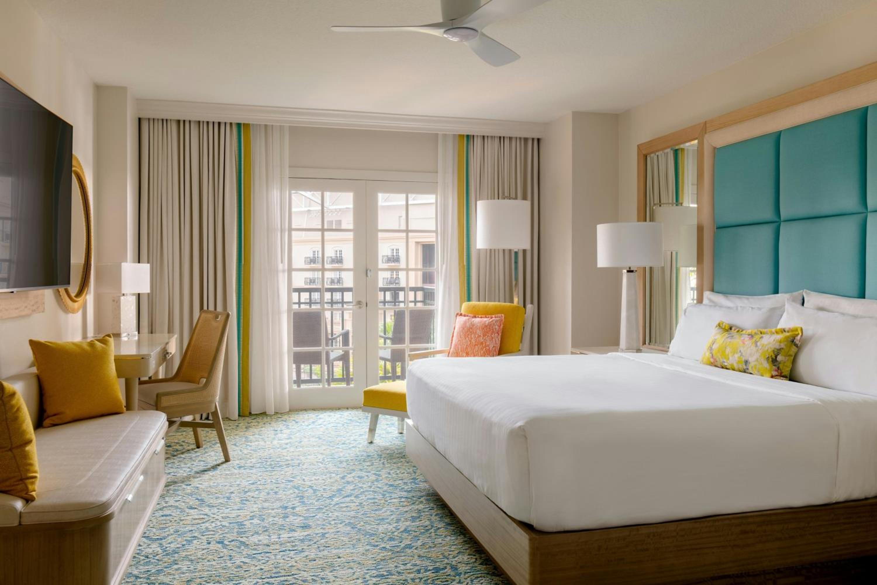 King Room with Atrium View and Balcony - Mobility Accessible with Roll-In Shower