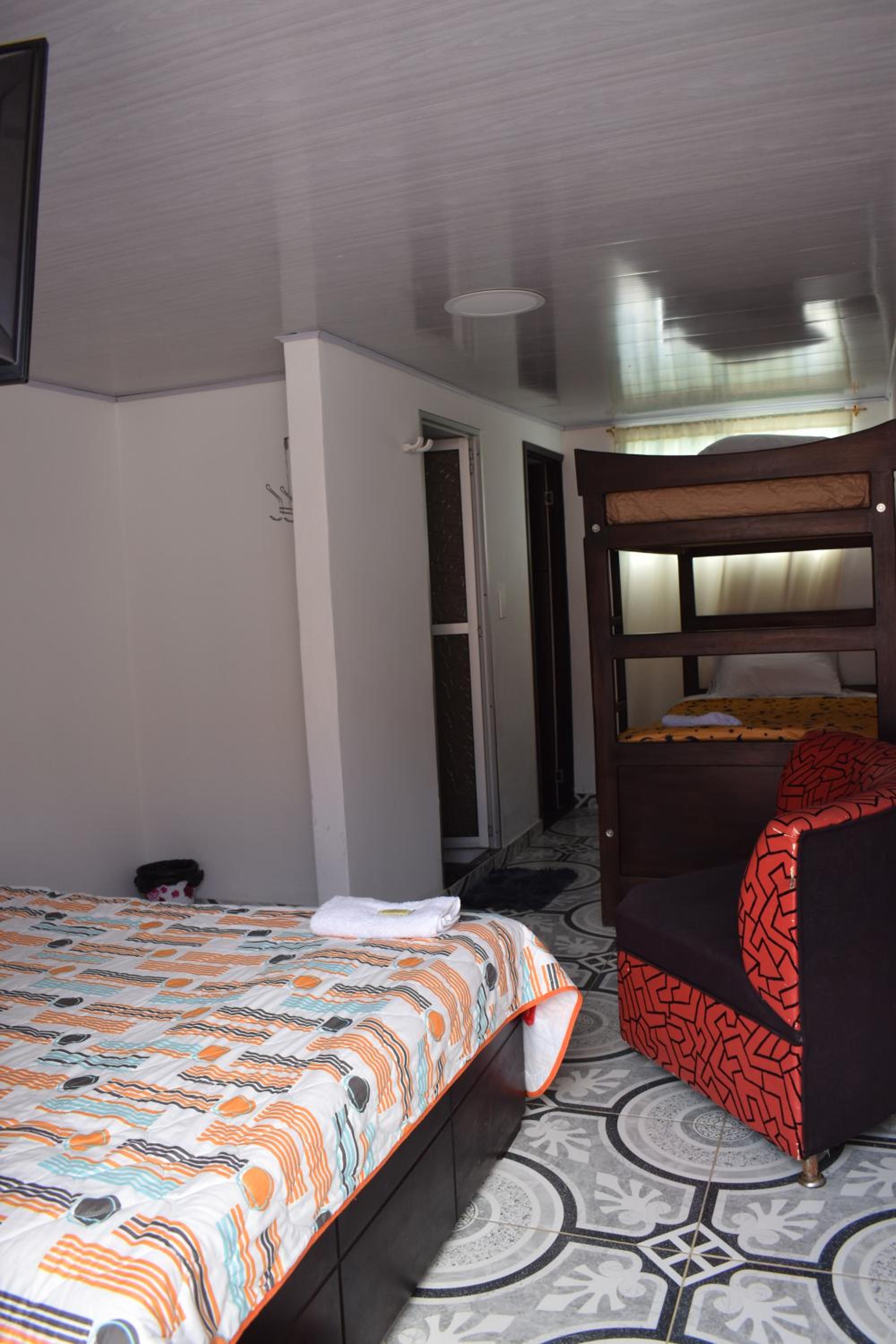 Basic Triple Room with Shared Bathroom photo 1