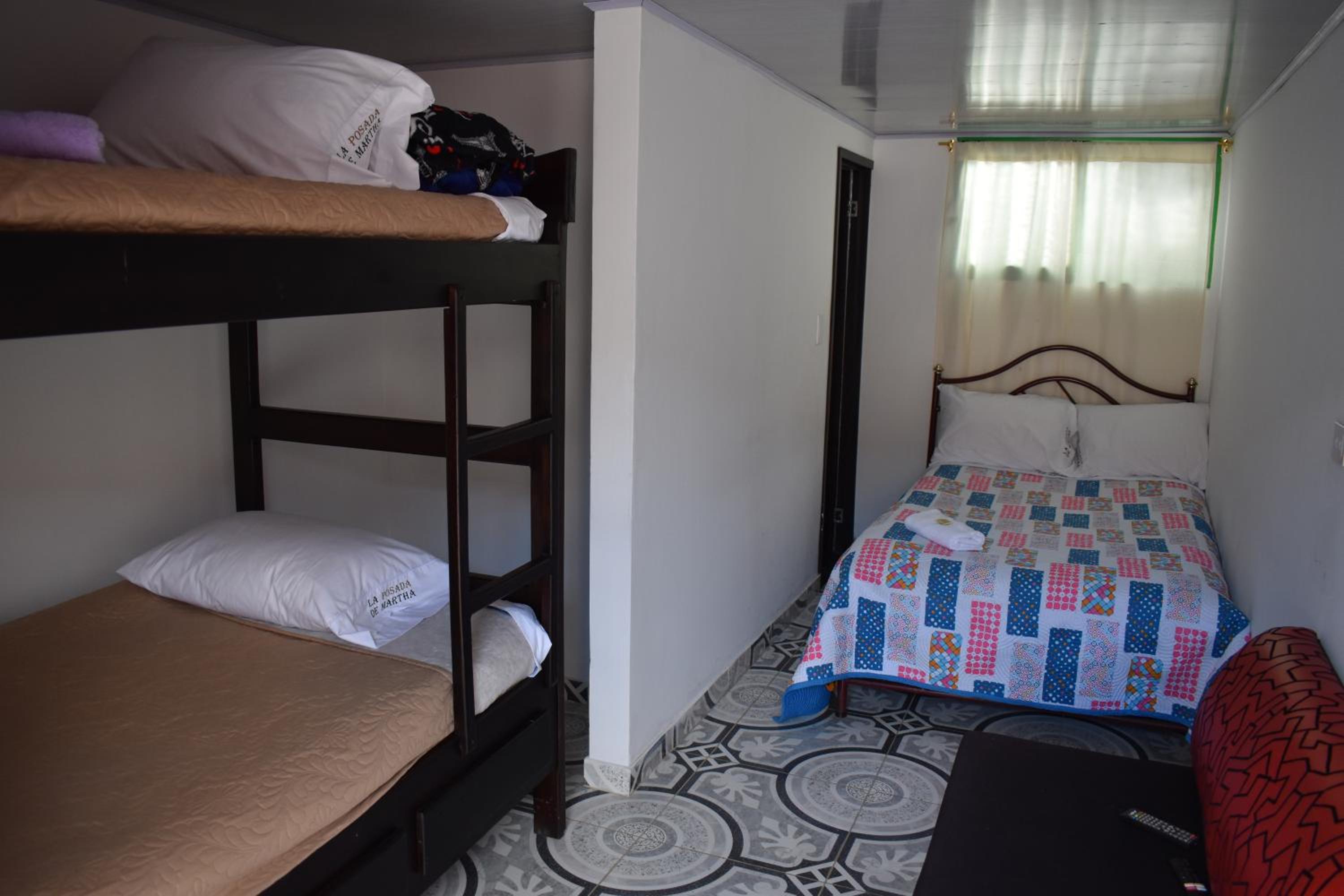 Basic Triple Room with Shared Bathroom photo 2