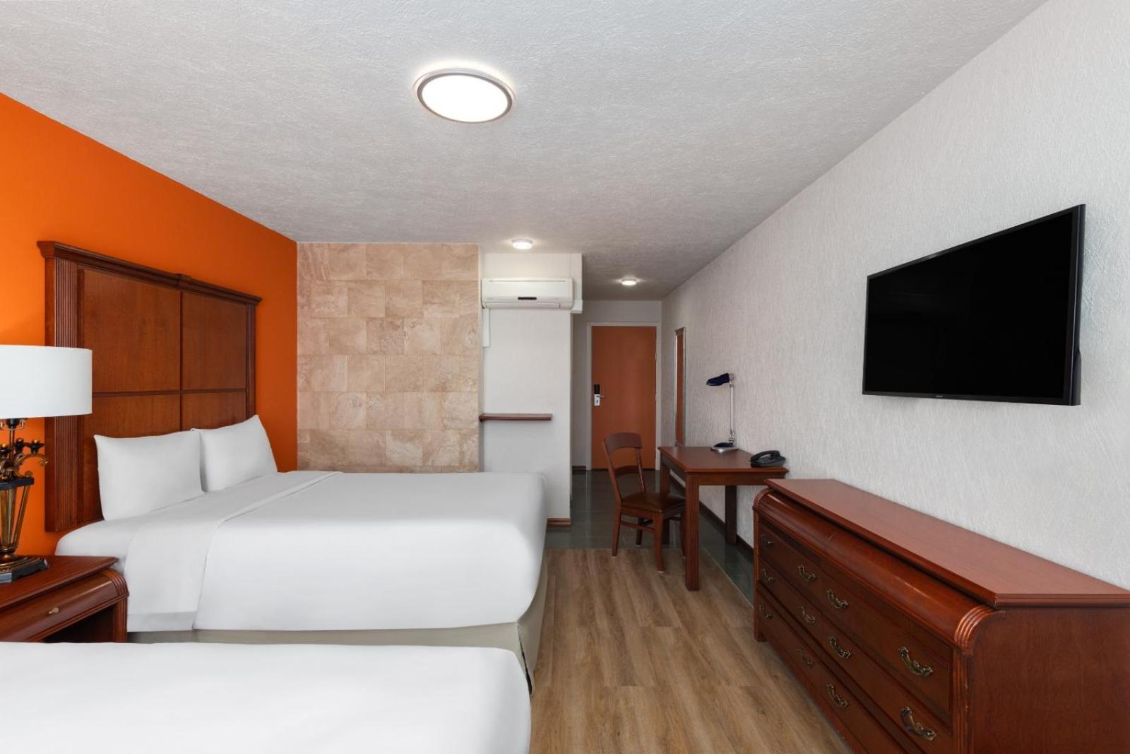 Mobility Accessible Room with One Queen Bed, One Single Bed, Non-Smoking