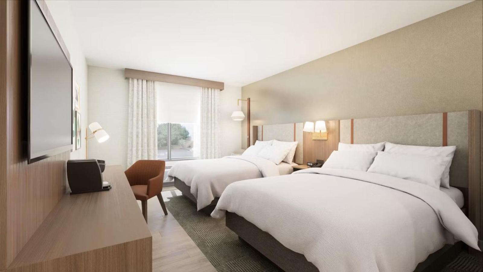 Standard Queen Room with Two Queen Beds and Bath/Shower photo 1