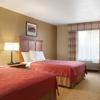 Queen Room with Two Queen Beds - Photo 2