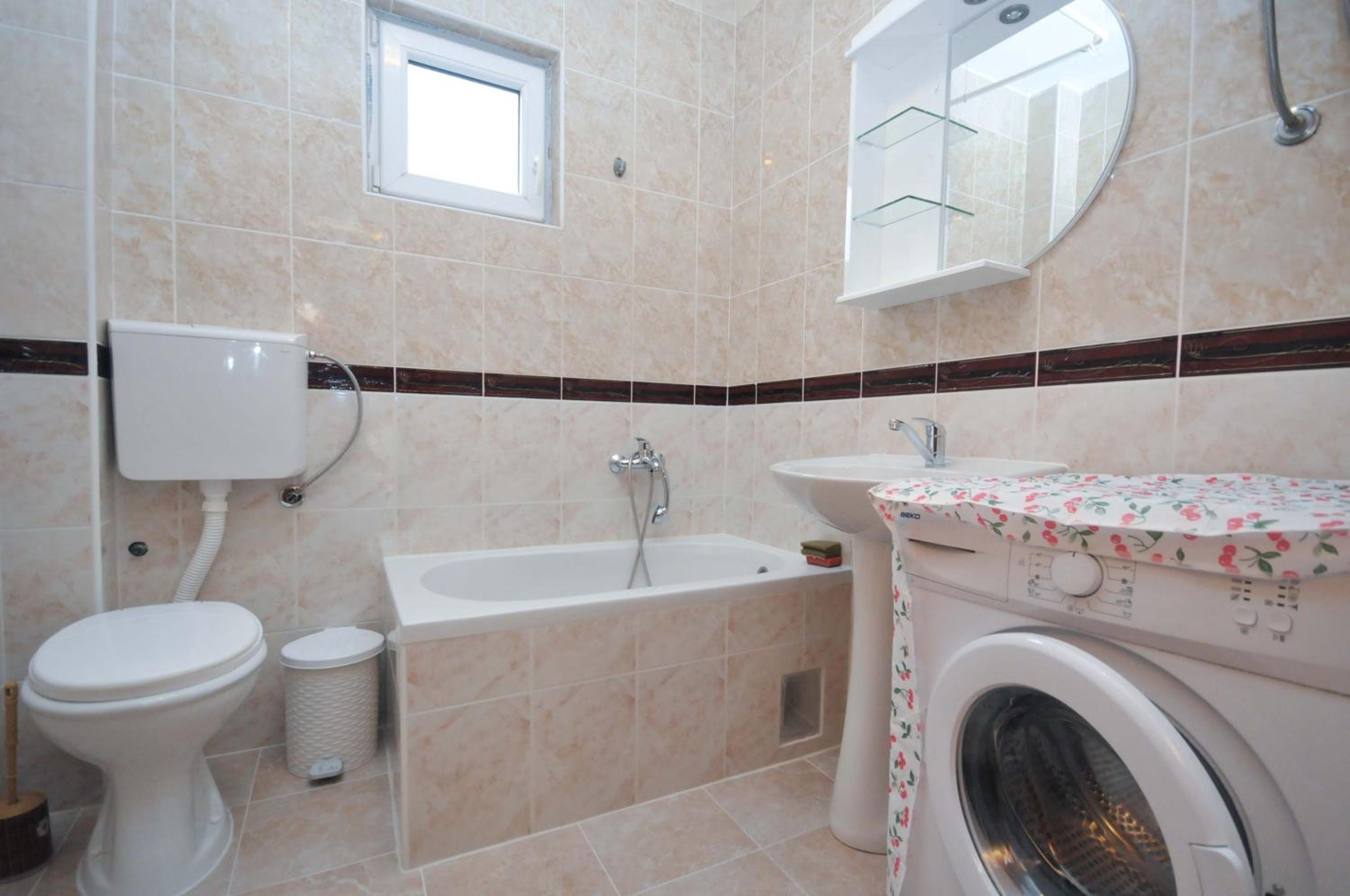 Four-Bedroom Apartment - Photo 13