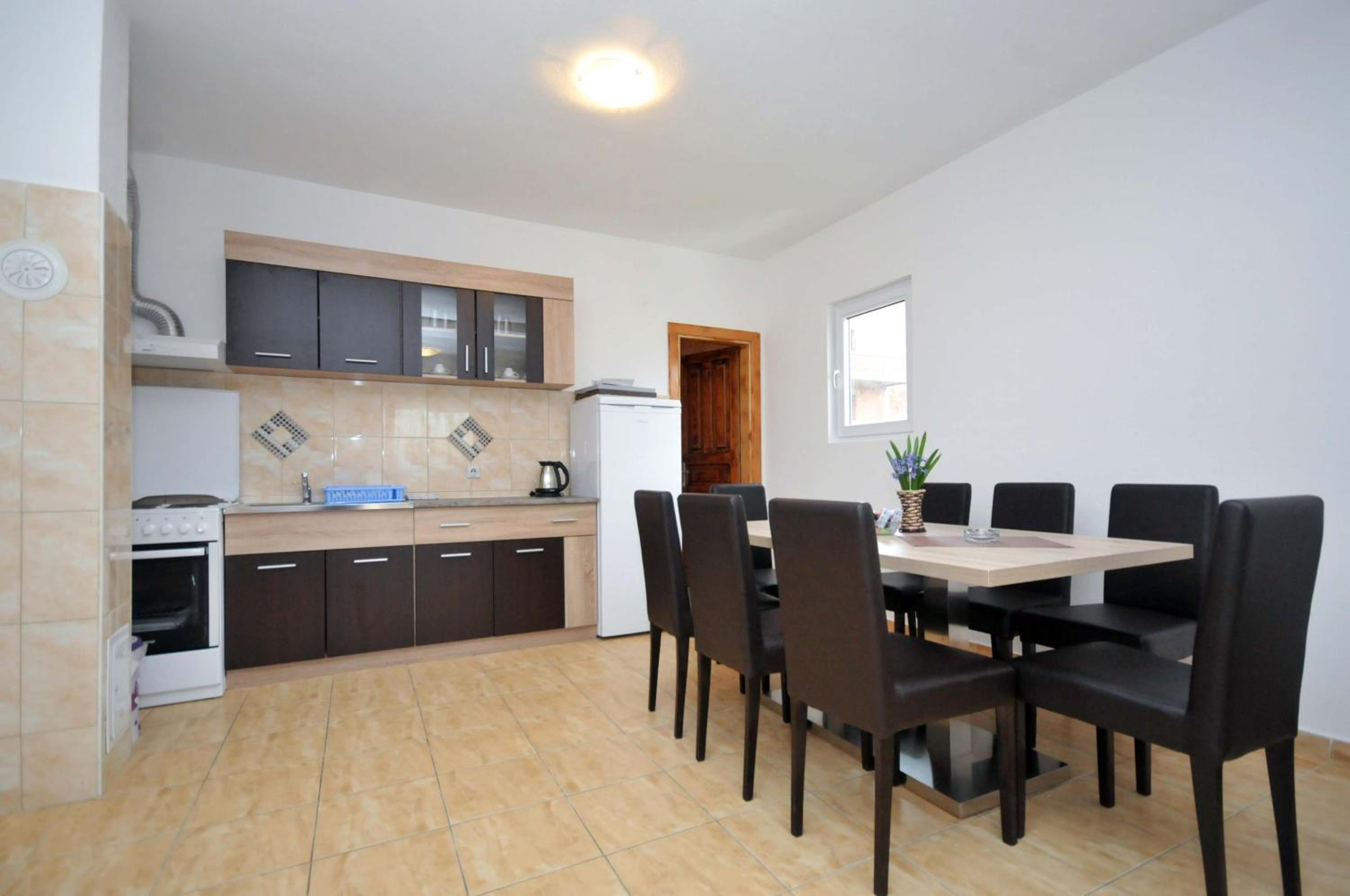 Four-Bedroom Apartment - Photo 11