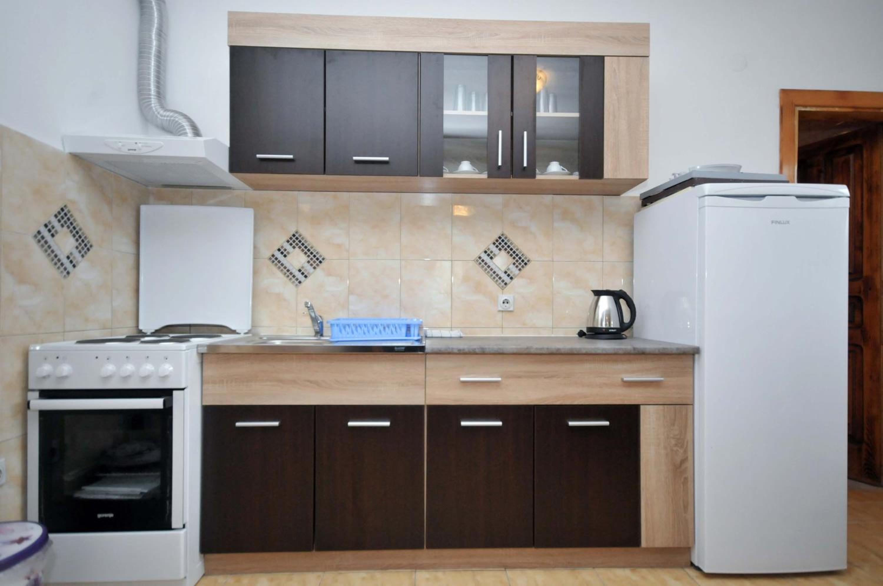 Four-Bedroom Apartment - Photo 10