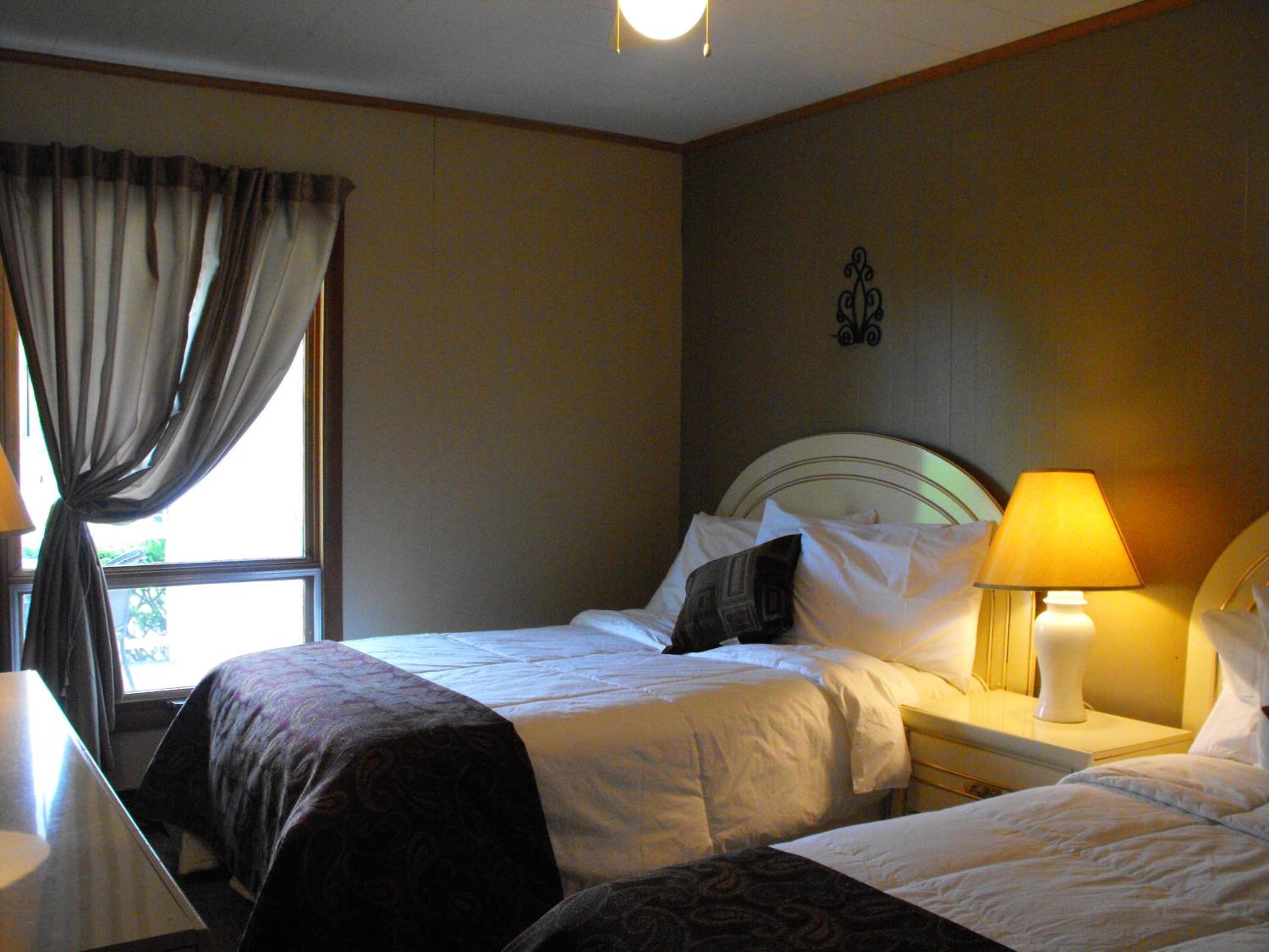 Family Suite Two Bedroom with Queen and Two Twin Beds photo 3