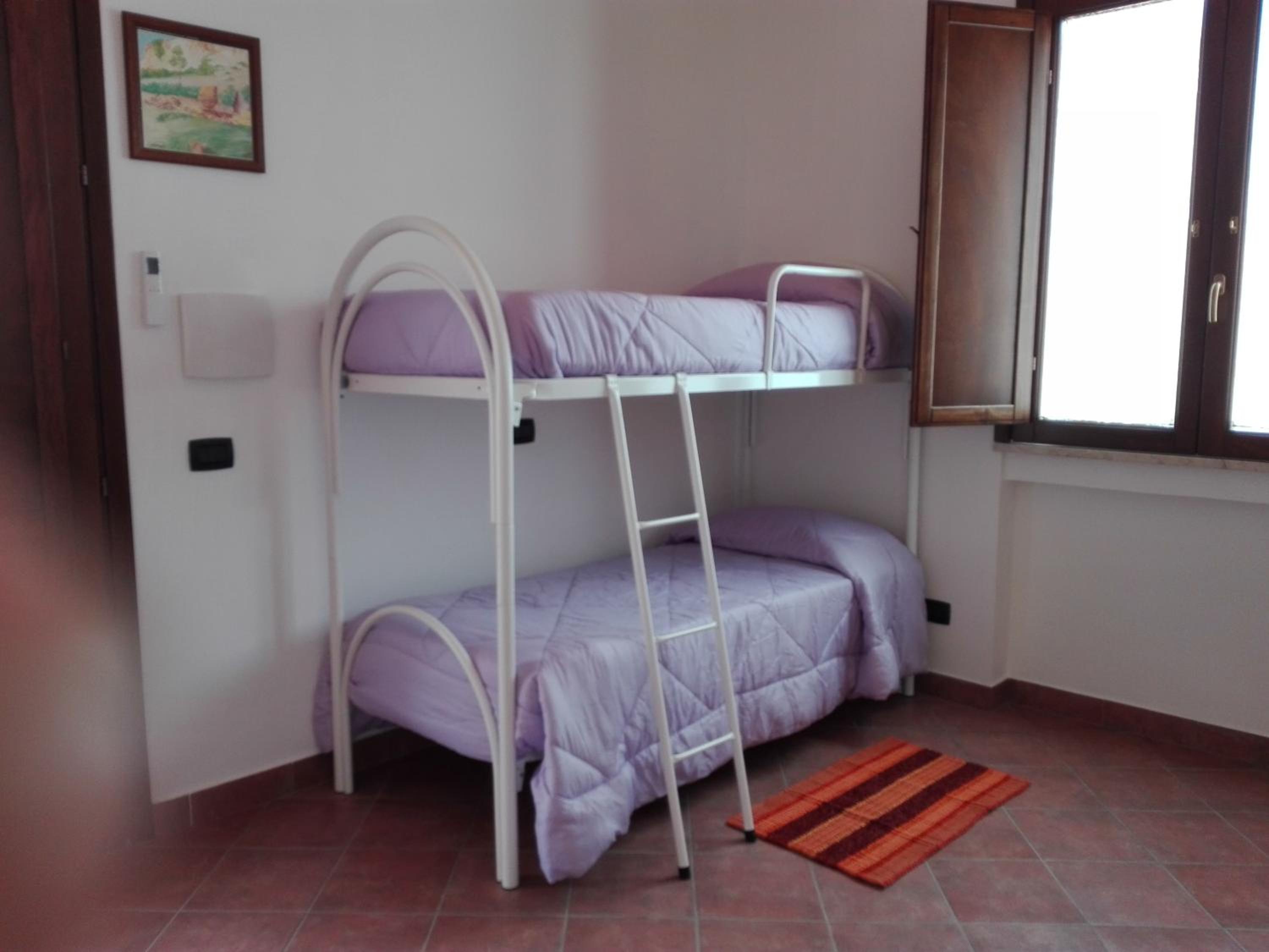 Quadruple Room with Private Bathroom photo 3
