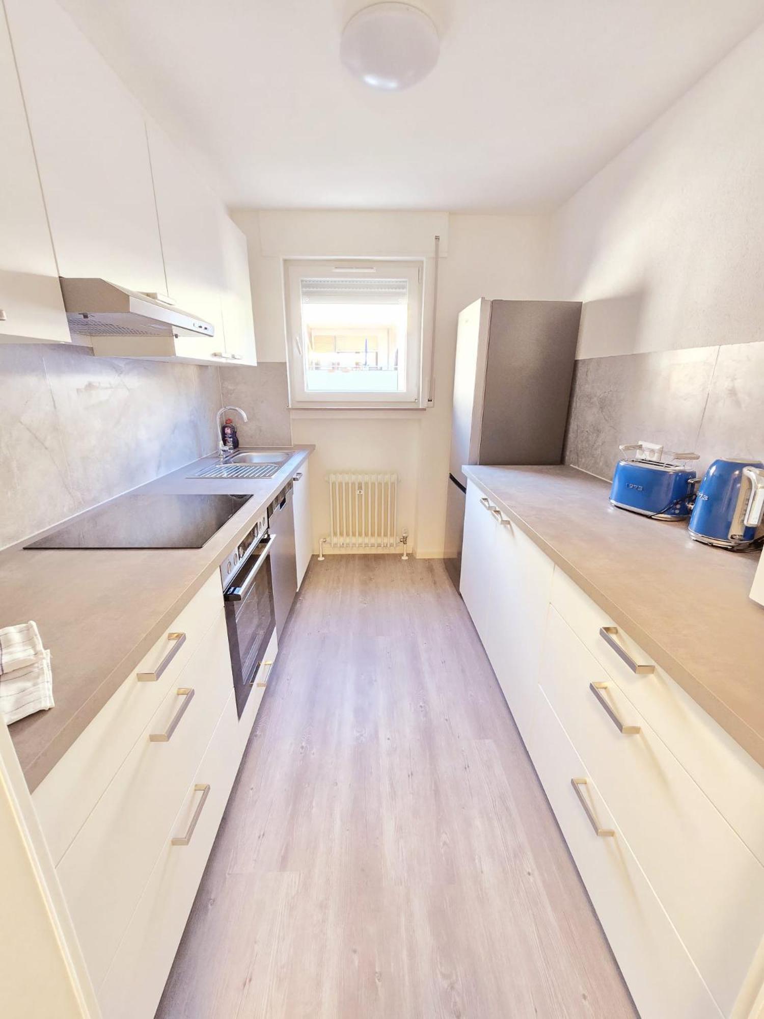 Three-Bedroom Apartment with Balcony photo 1