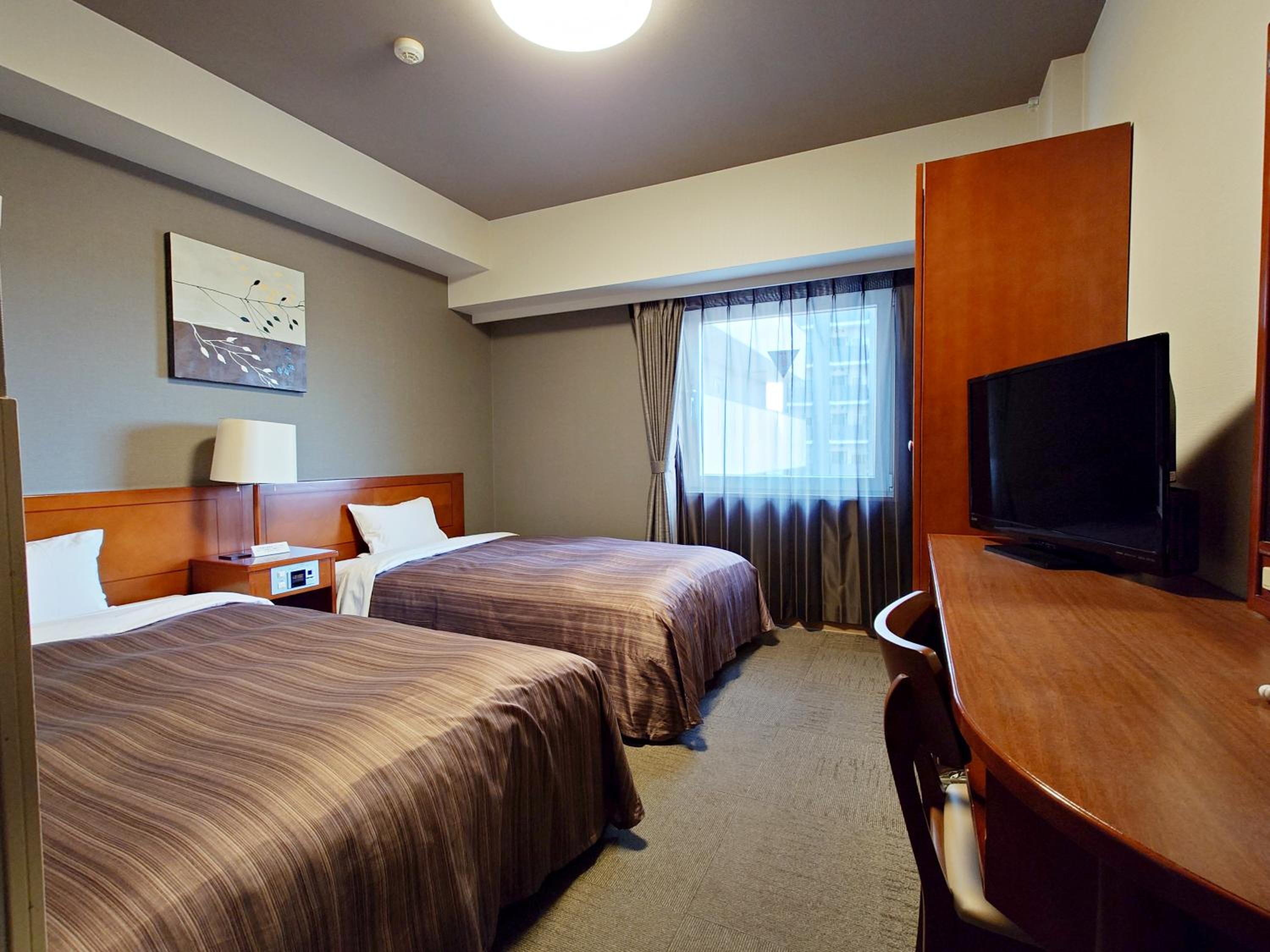 Twin Room - Smoking - Heated Tobacco Only - Photo 1