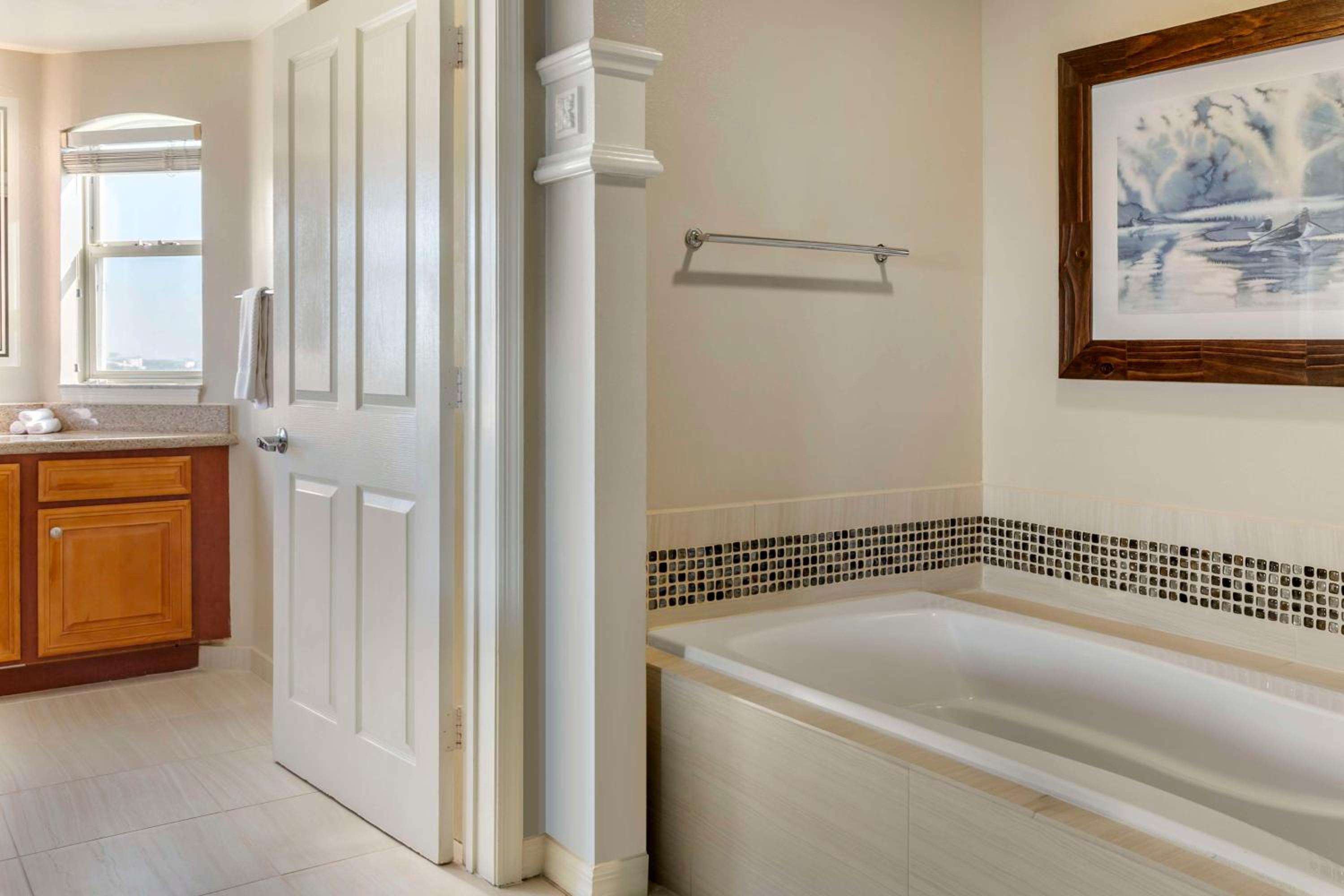 Three-Bedroom Suite with One King Bed, Four Queen Beds, and Sofa Bed