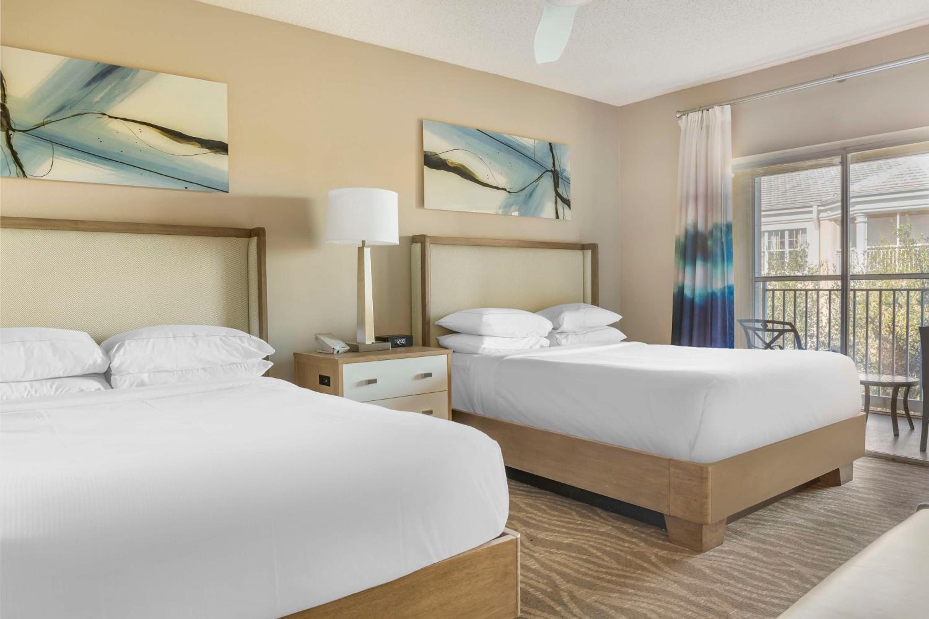 Three-Bedroom Suite with One King Bed, Four Queen Beds, and Sofa Bed