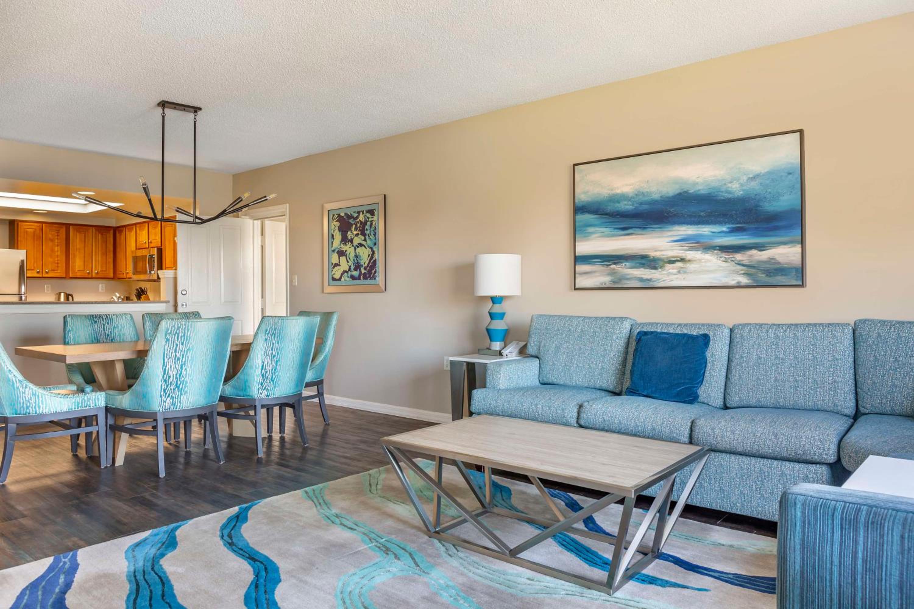 Three-Bedroom Suite with One King Bed, Four Queen Beds, and Sofa Bed