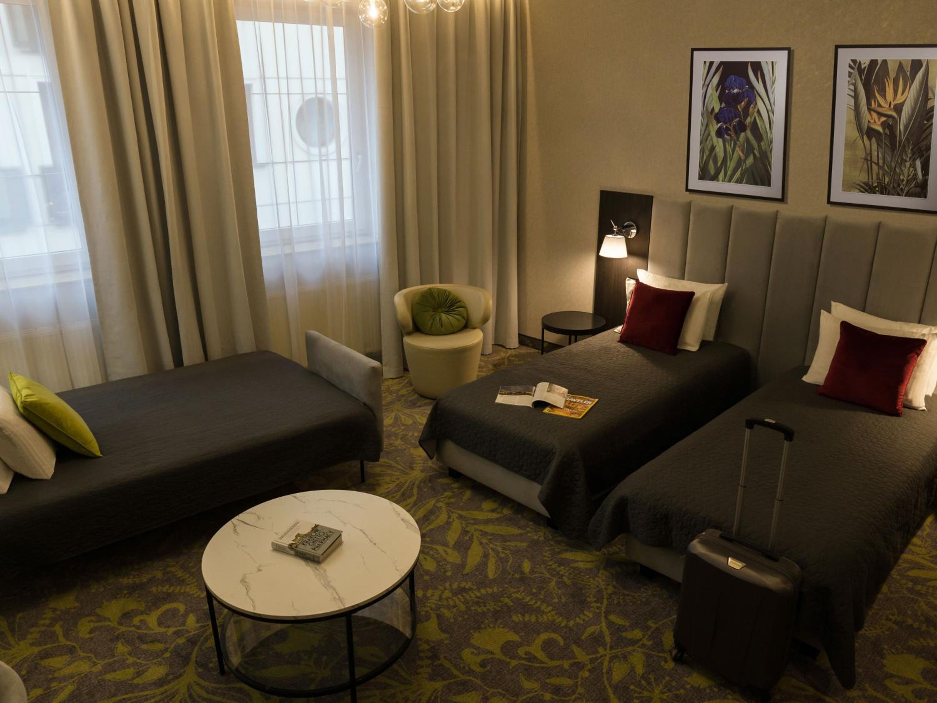 Premium Triple Room - Photo 1
