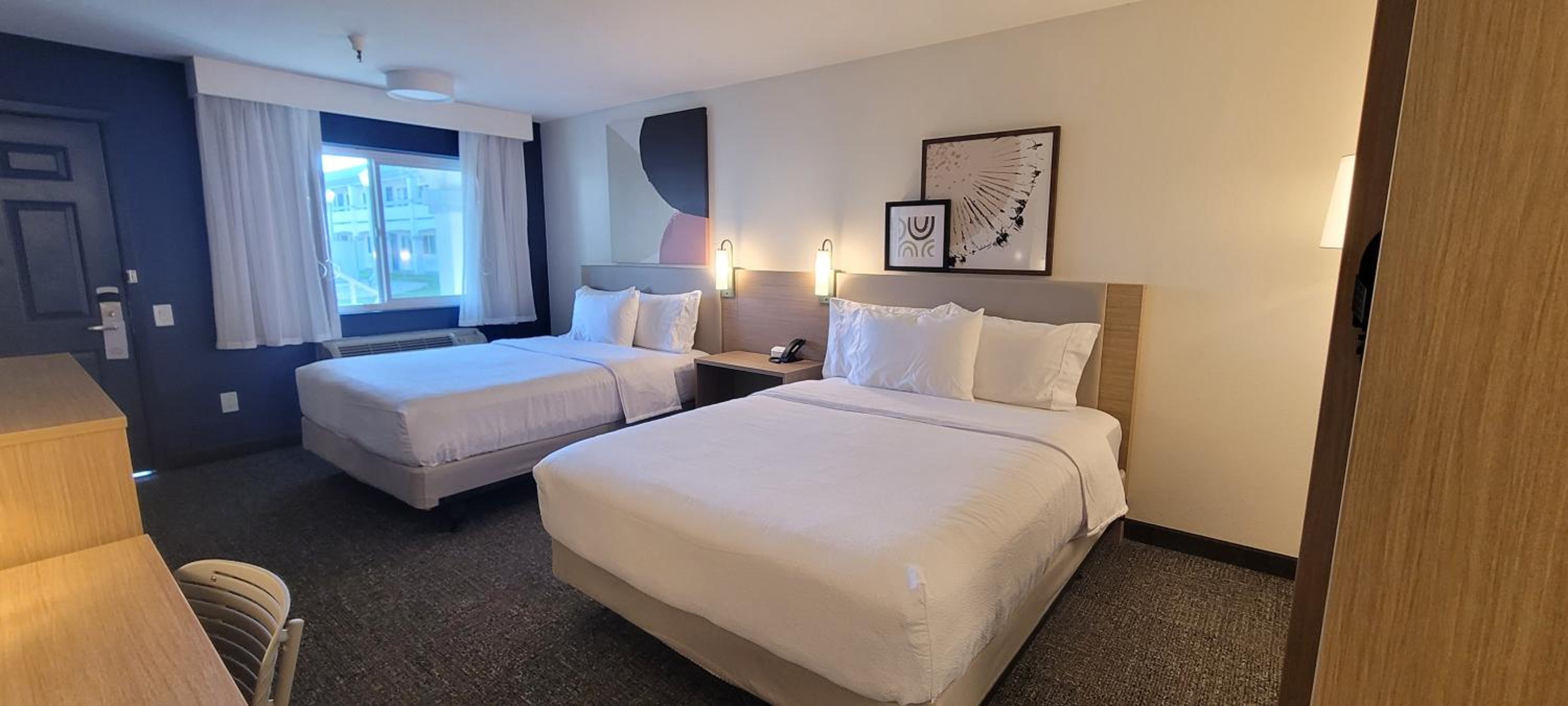 Queen Room with Two Queen Beds - Photo 9