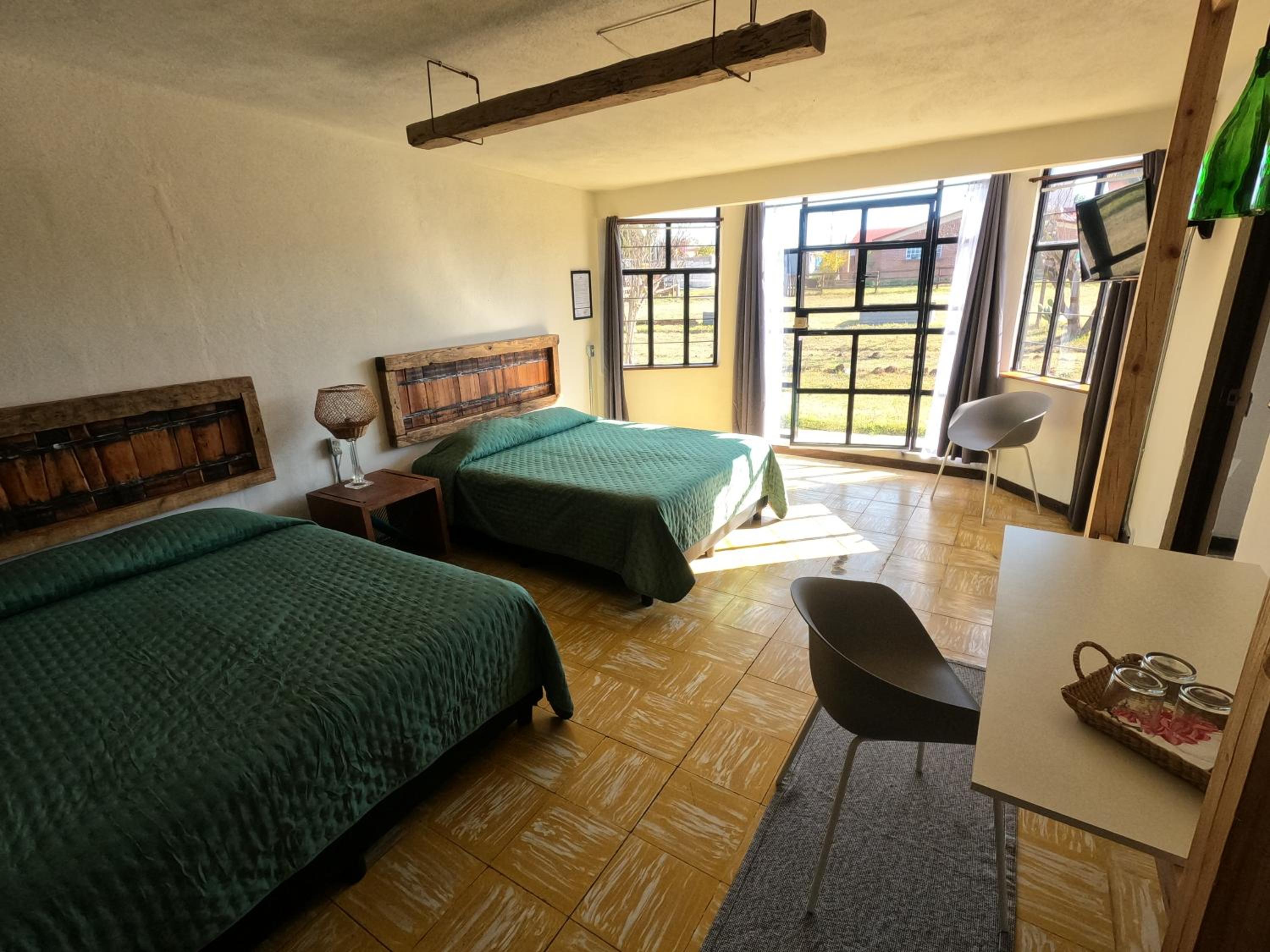 Standard Queen Room with Two Queen Beds photo 1