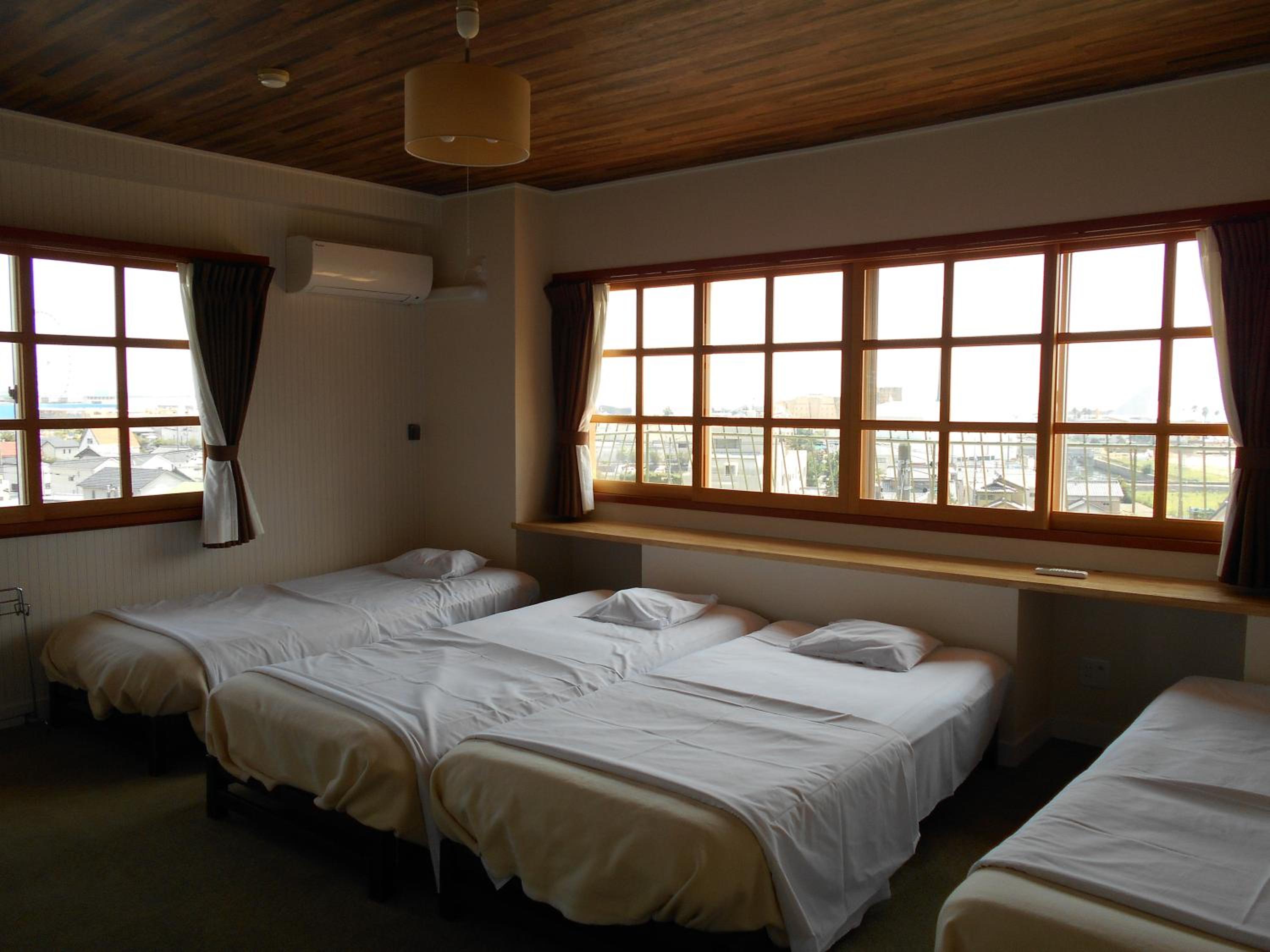 Standard Quadruple Room with Shared Bathroom photo 1