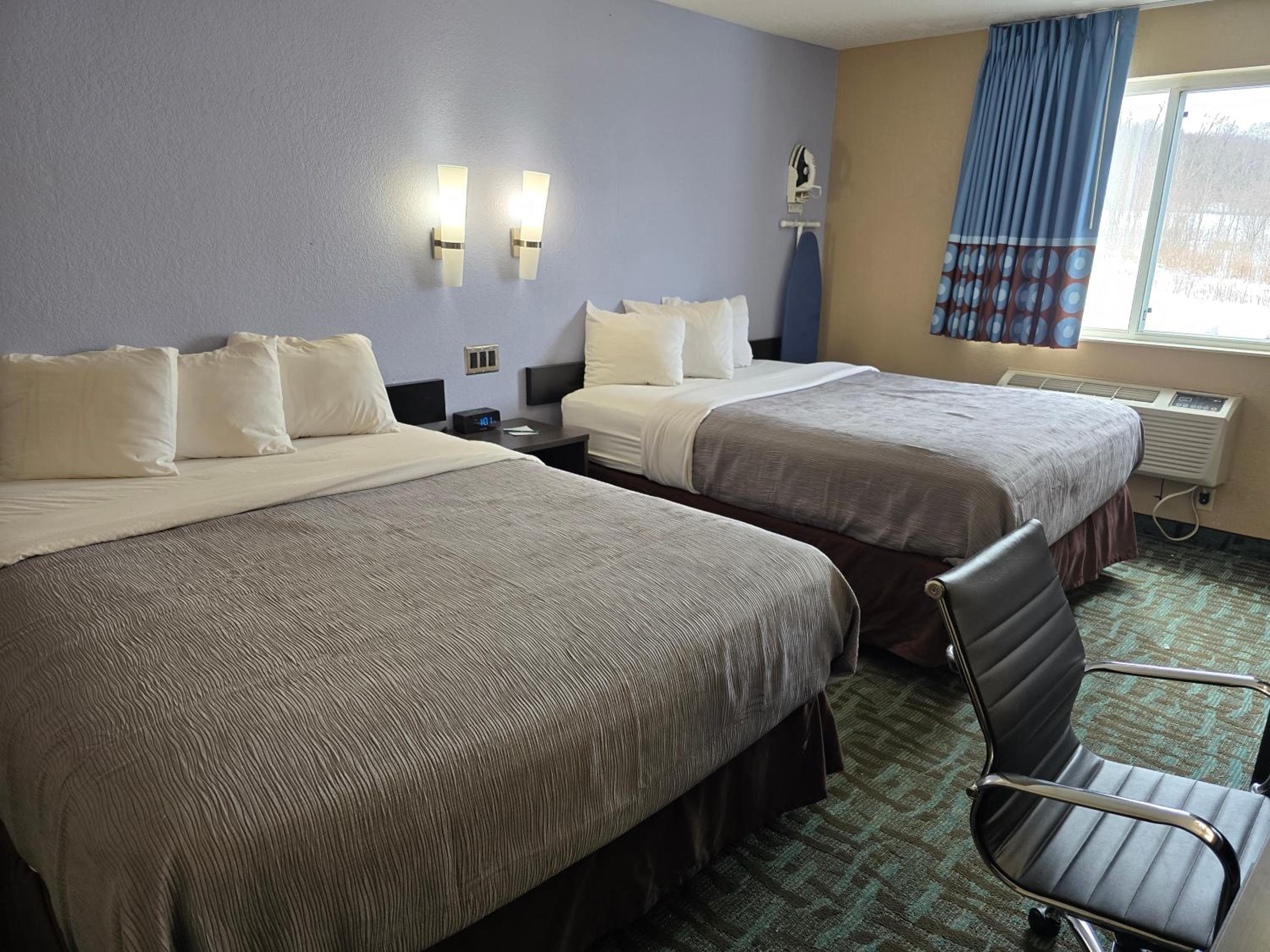 Quadruple Room with Two Queen Beds - Non Smoking/Interior Hall - Photo 1
