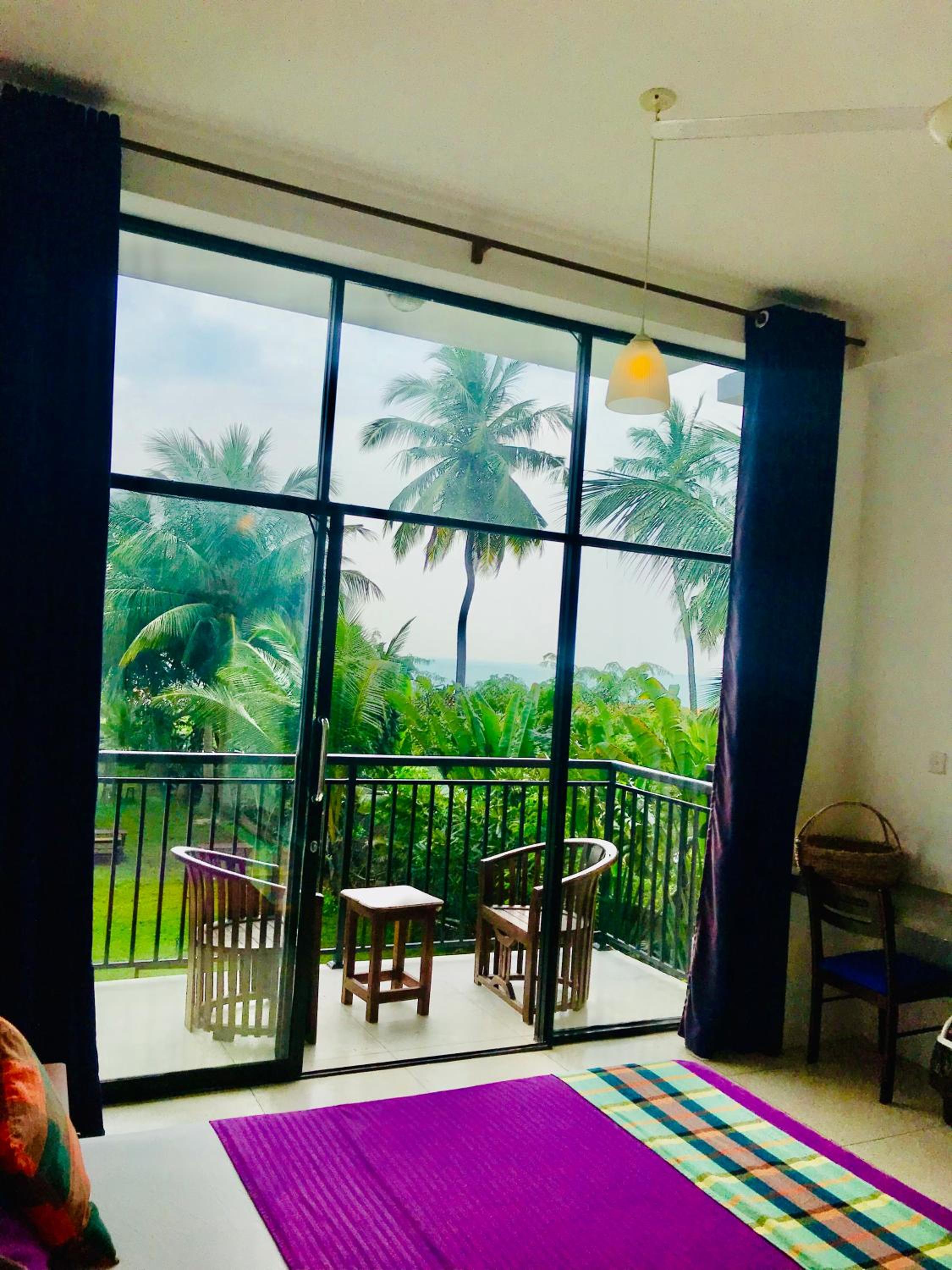 Deluxe Double Room with Side Sea View