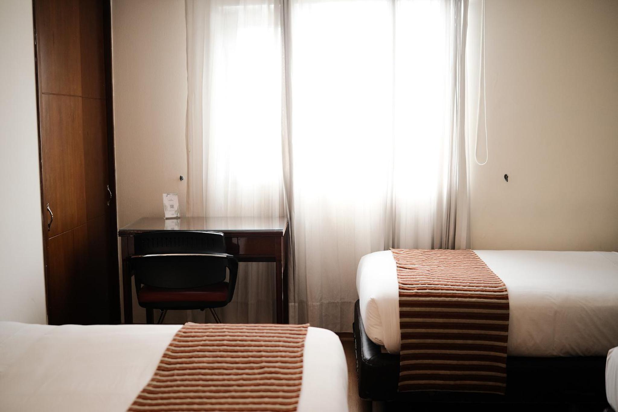 Quadruple Room with Private Bathroom