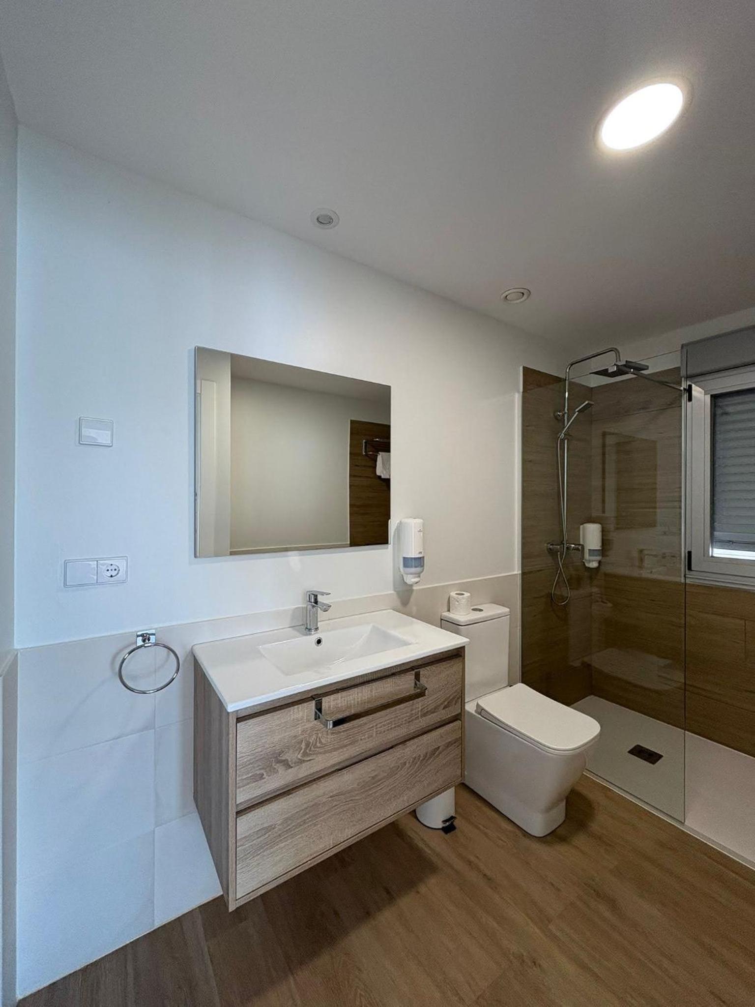 One-Bedroom Apartment with Balcony and City View