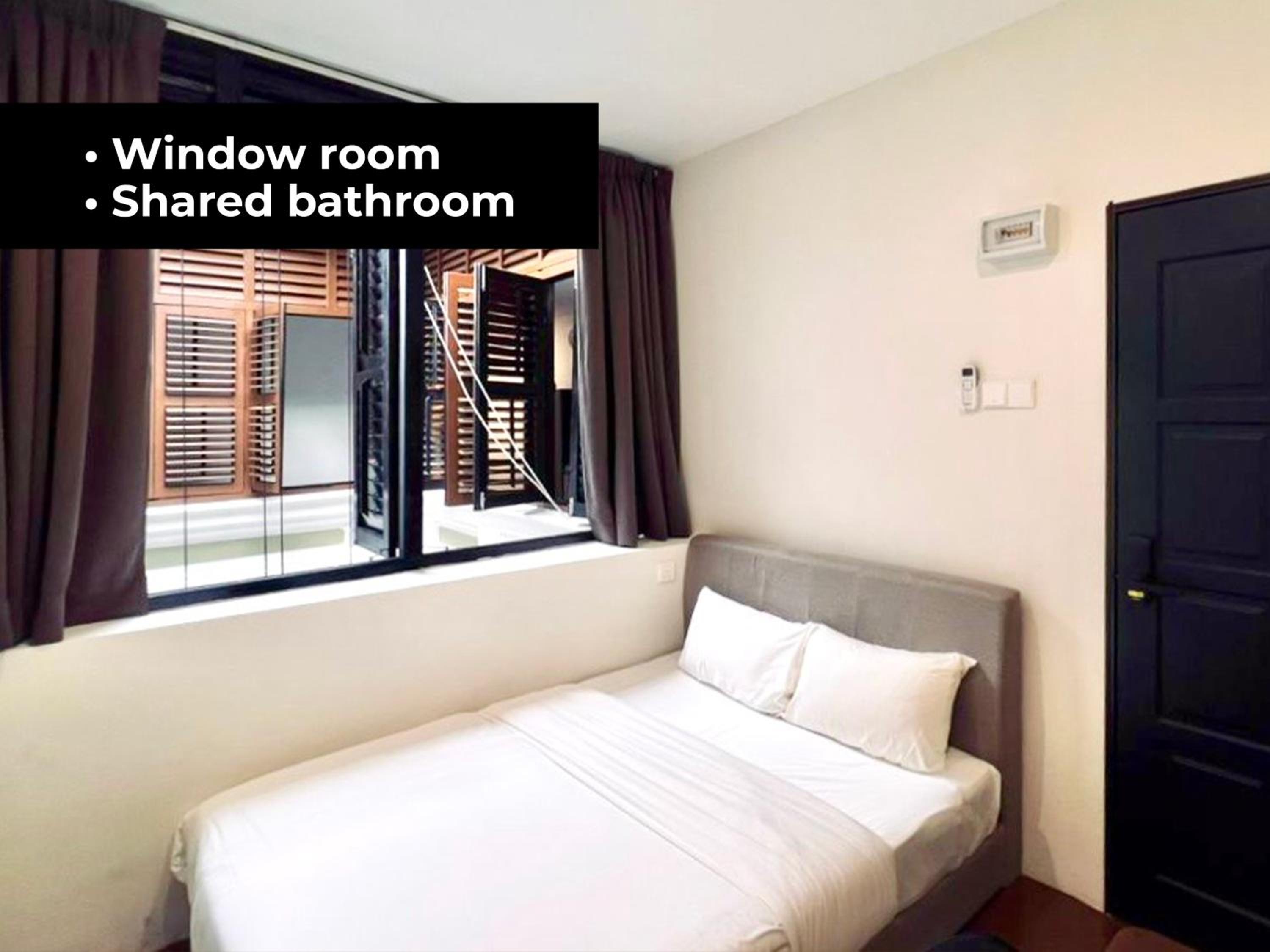 Queen Room with Shared Bathroom