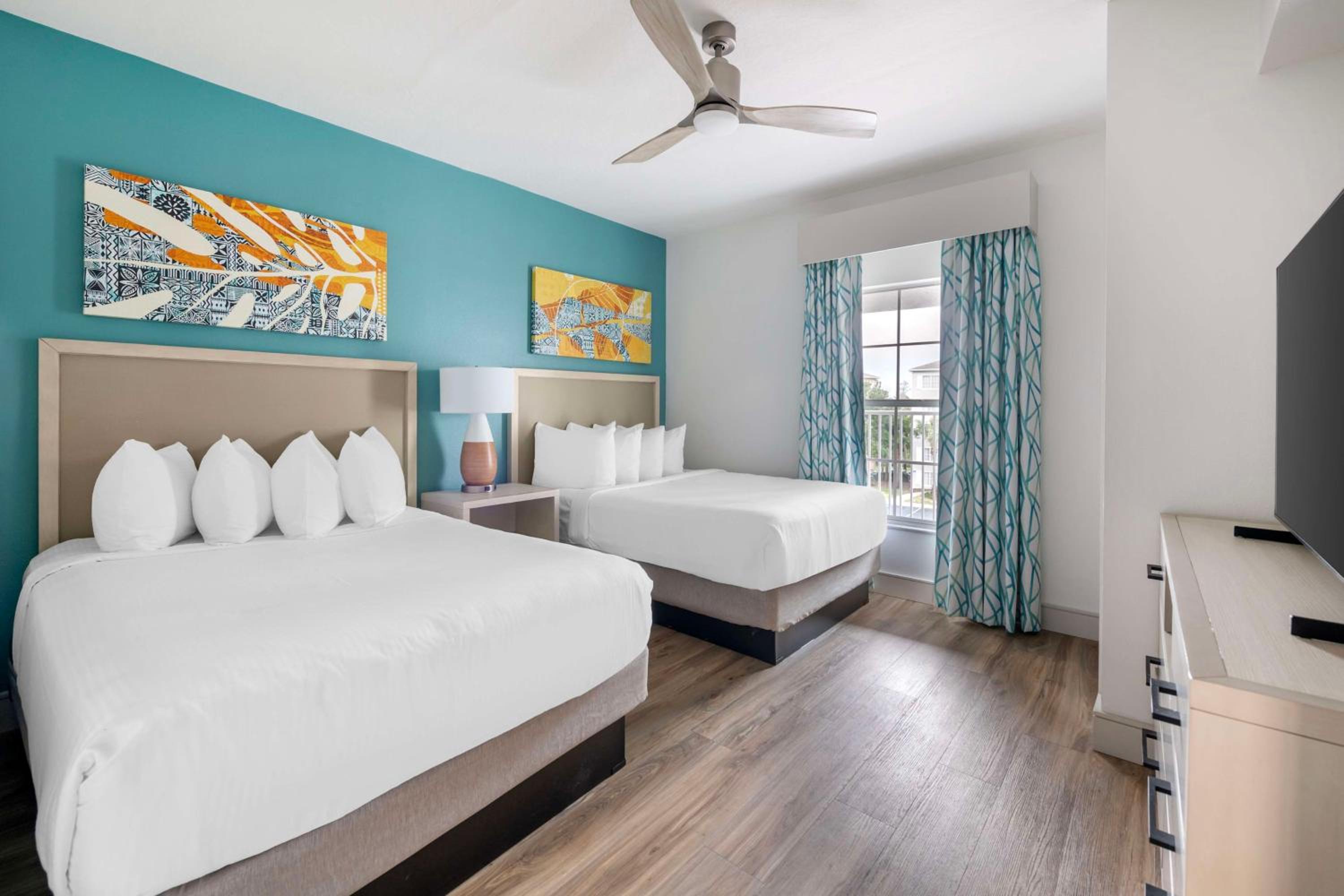 Three-Bedroom King Suite with One Queen and Two Double Beds