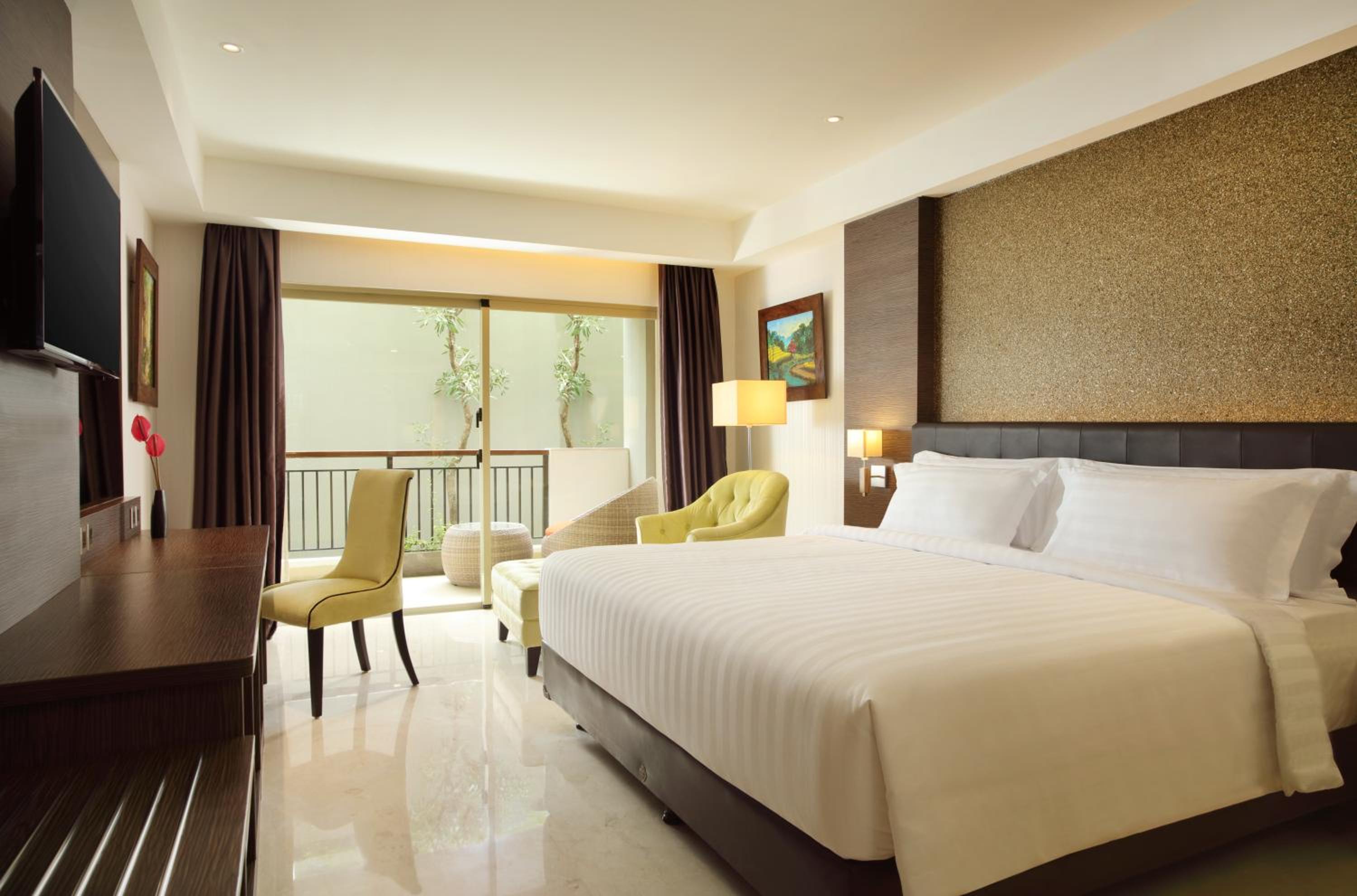 Deluxe King Balcony Room with Vertical Garden View, with FREE daily shuttle to Ubud City, FREE Photo Session, FREE Art Gallery Visit, 24-hour access to Fitness Center, FREE Welcome Drink, and FREE Kids Activities.