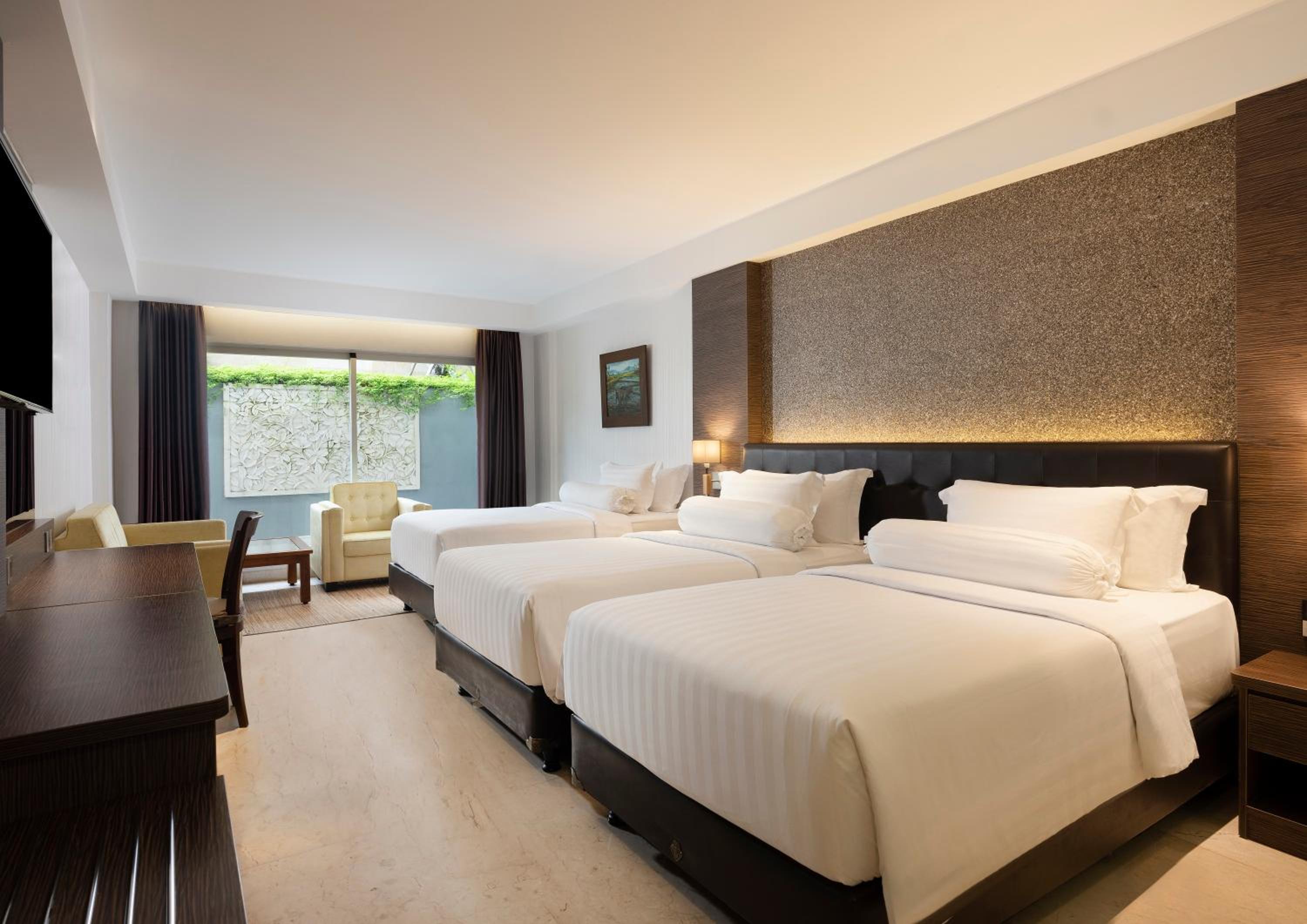 Deluxe Family Twin Room, with FREE daily shuttle to Ubud City, FREE Photo Session, FREE Art Gallery Visit, 24-hour access to Fitness Center, FREE Welcome Drink, and FREE Kids Activities.
