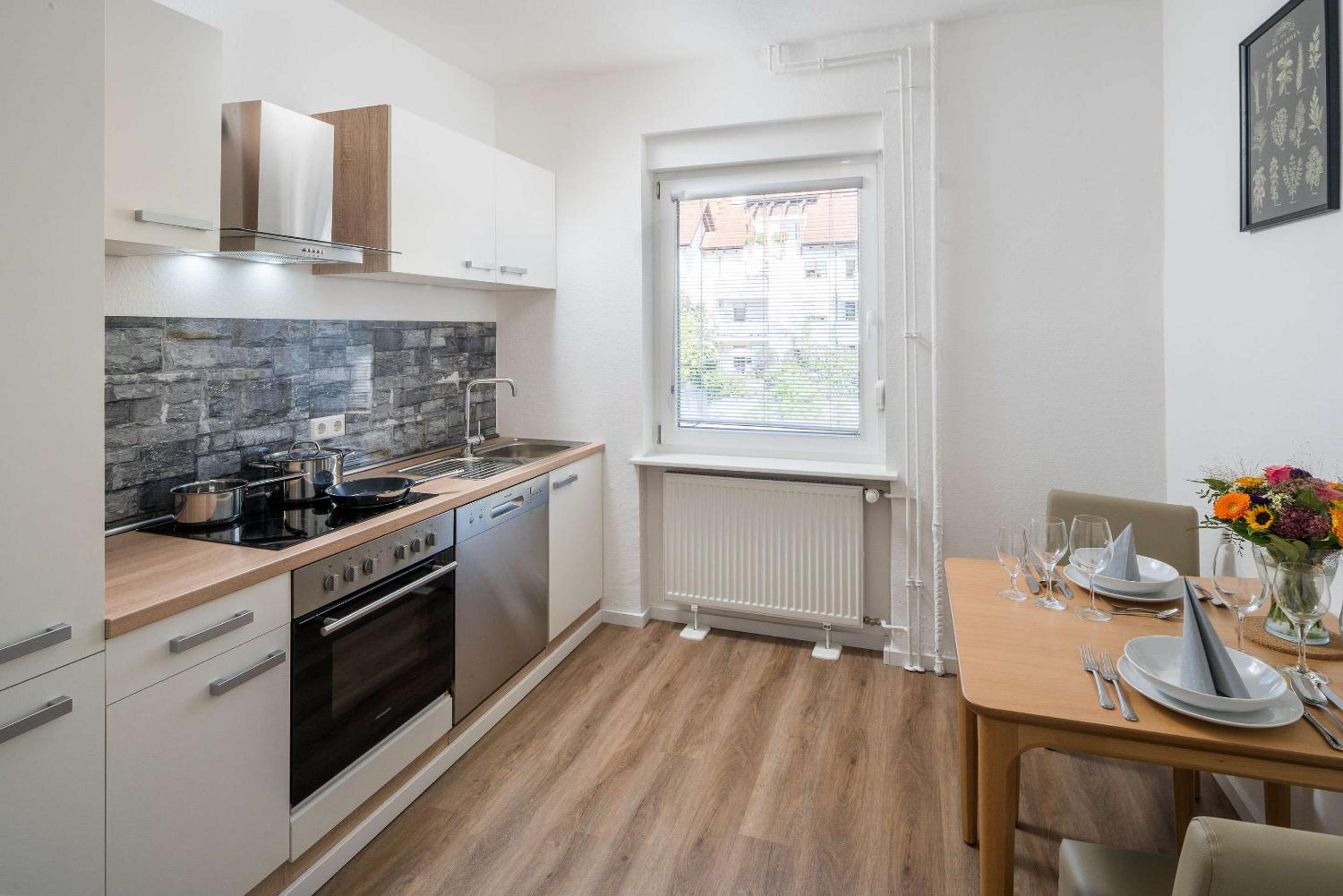 Two-Bedroom Apartment with One Double and Two Single Beds with Sofa Bed, Balcony and Full Kitchen