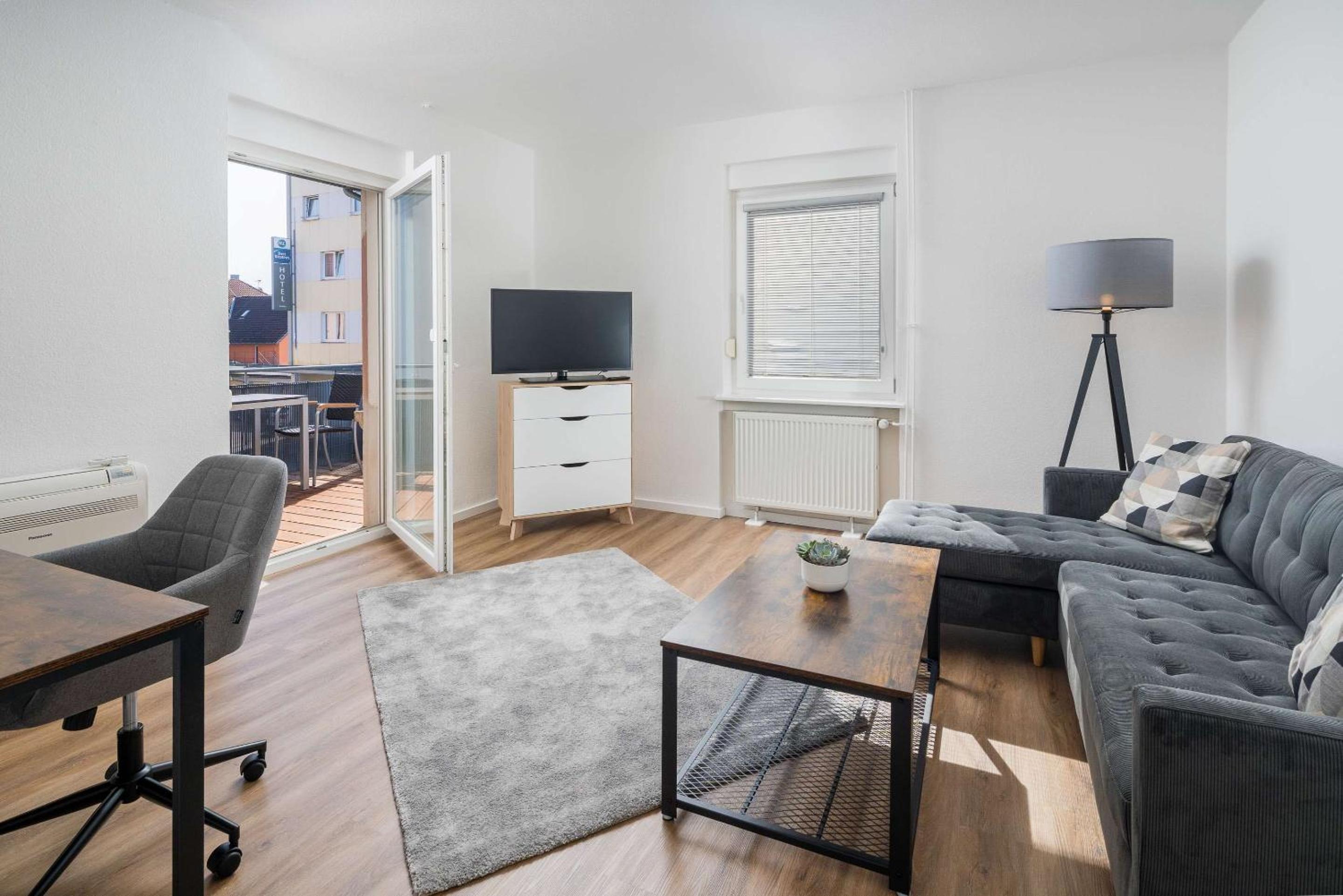Two-Bedroom Apartment with One Double and Two Single Beds with Sofa Bed, Balcony and Full Kitchen