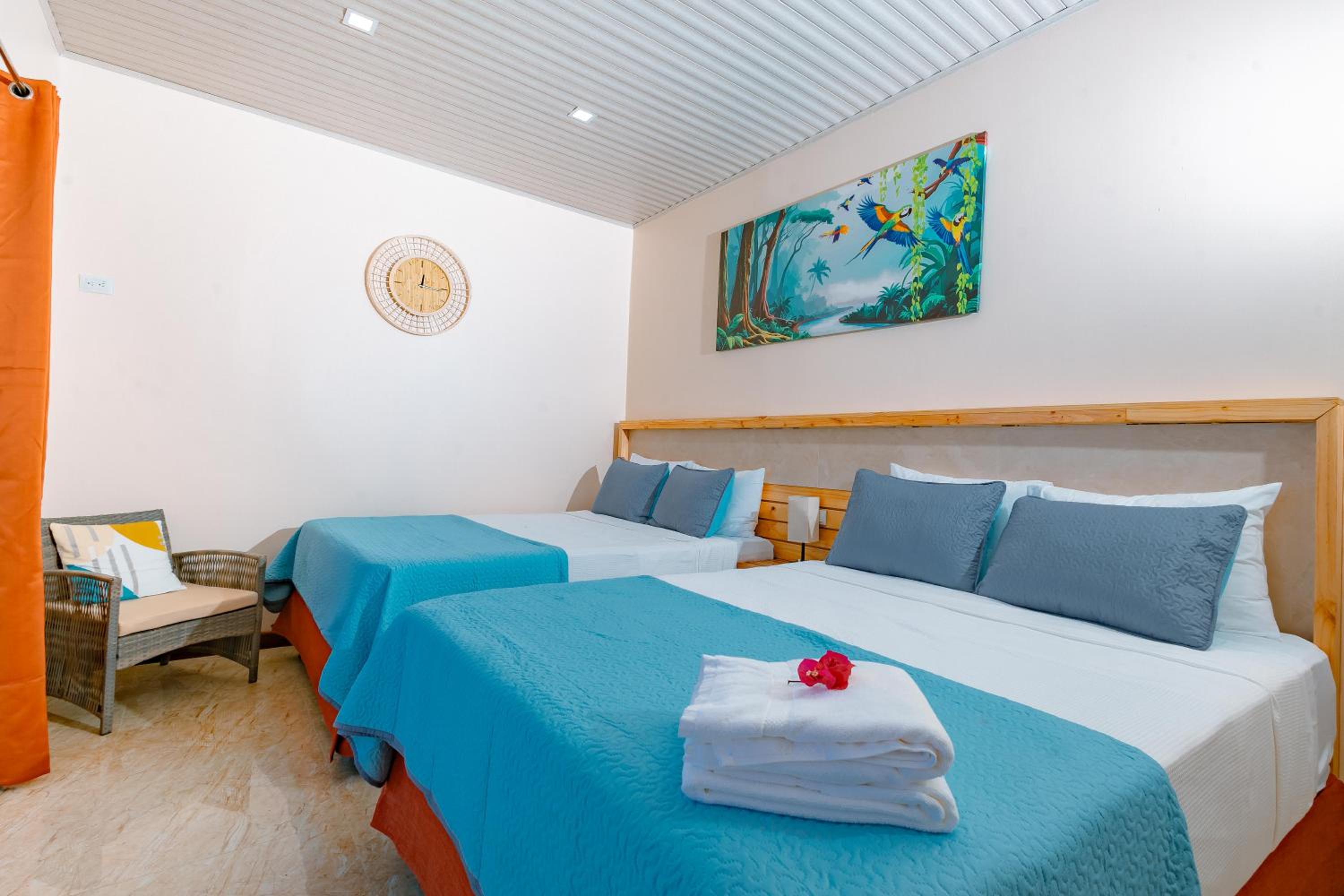 Deluxe Queen Room with Two Queen Beds photo 1