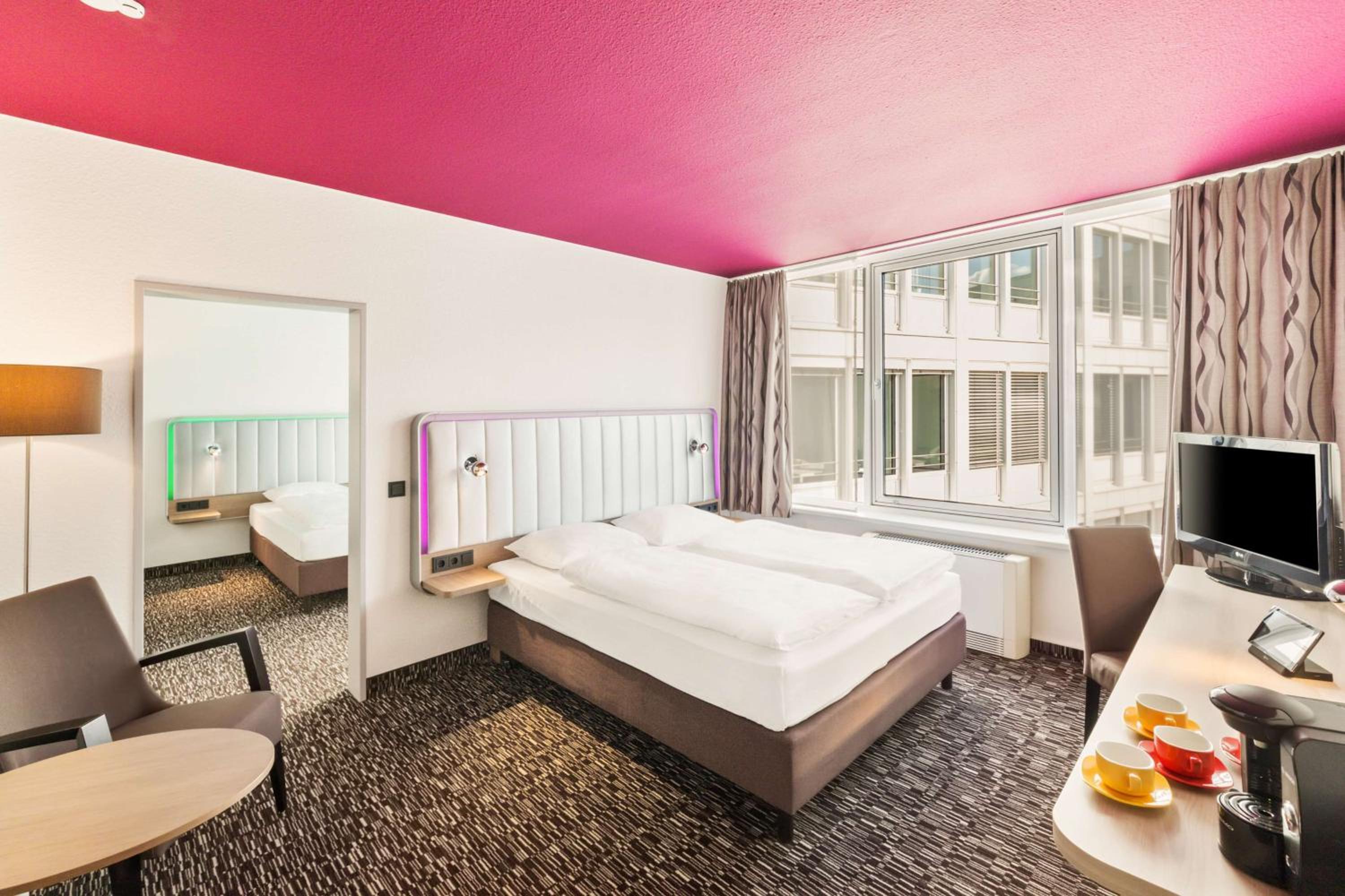 Two-Room Family Room with One Double and Two Single Beds - Photo 1