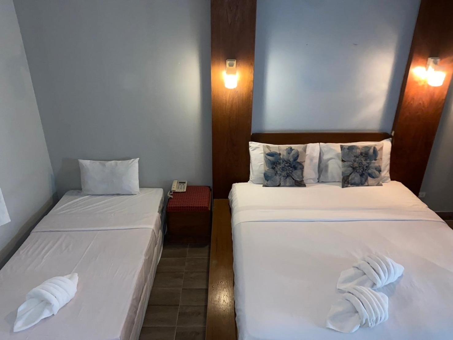 Standard Triple Room - Photo 8