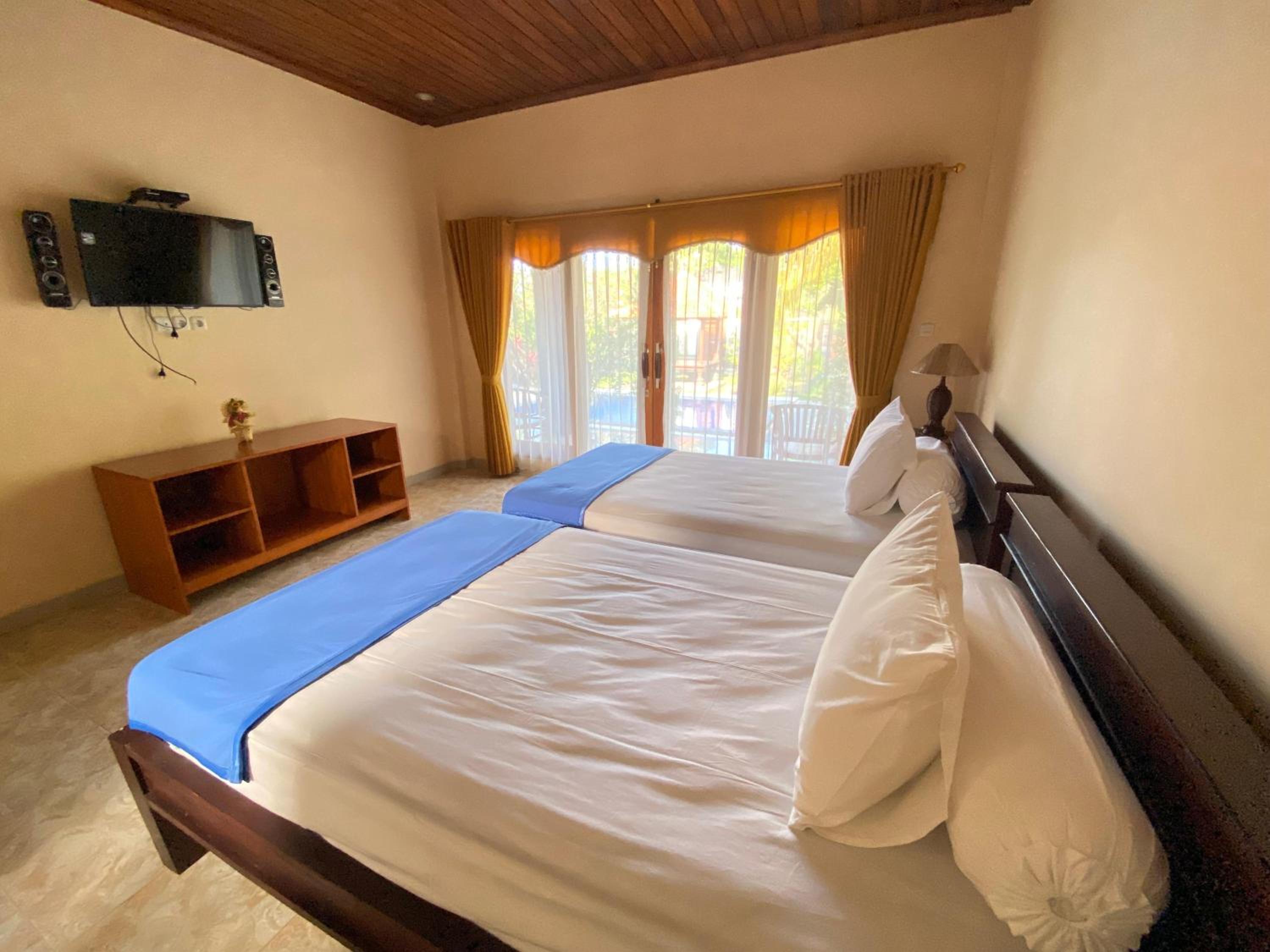 Standard Twin Room - Photo 4