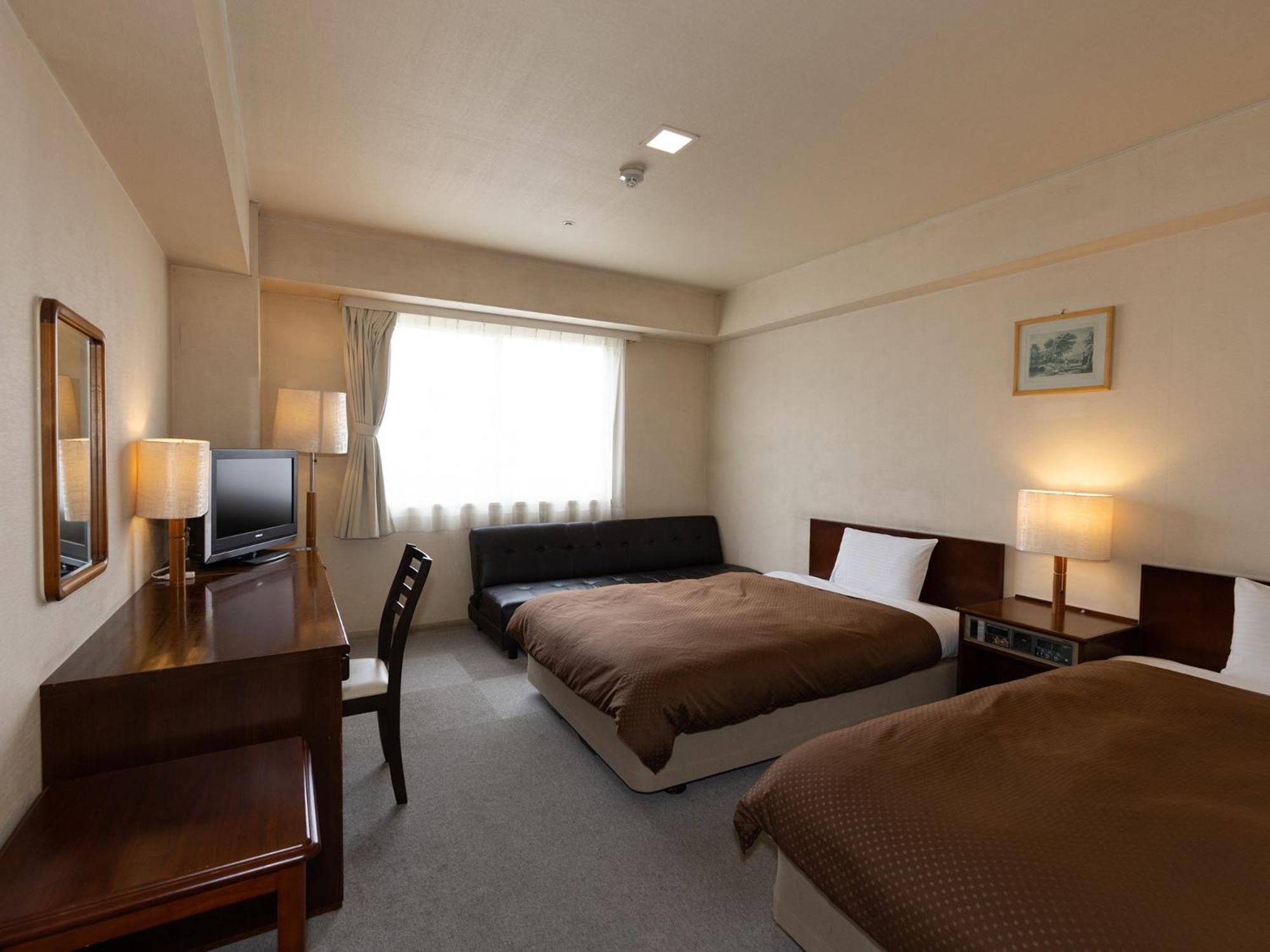 Twin Room - Photo 1