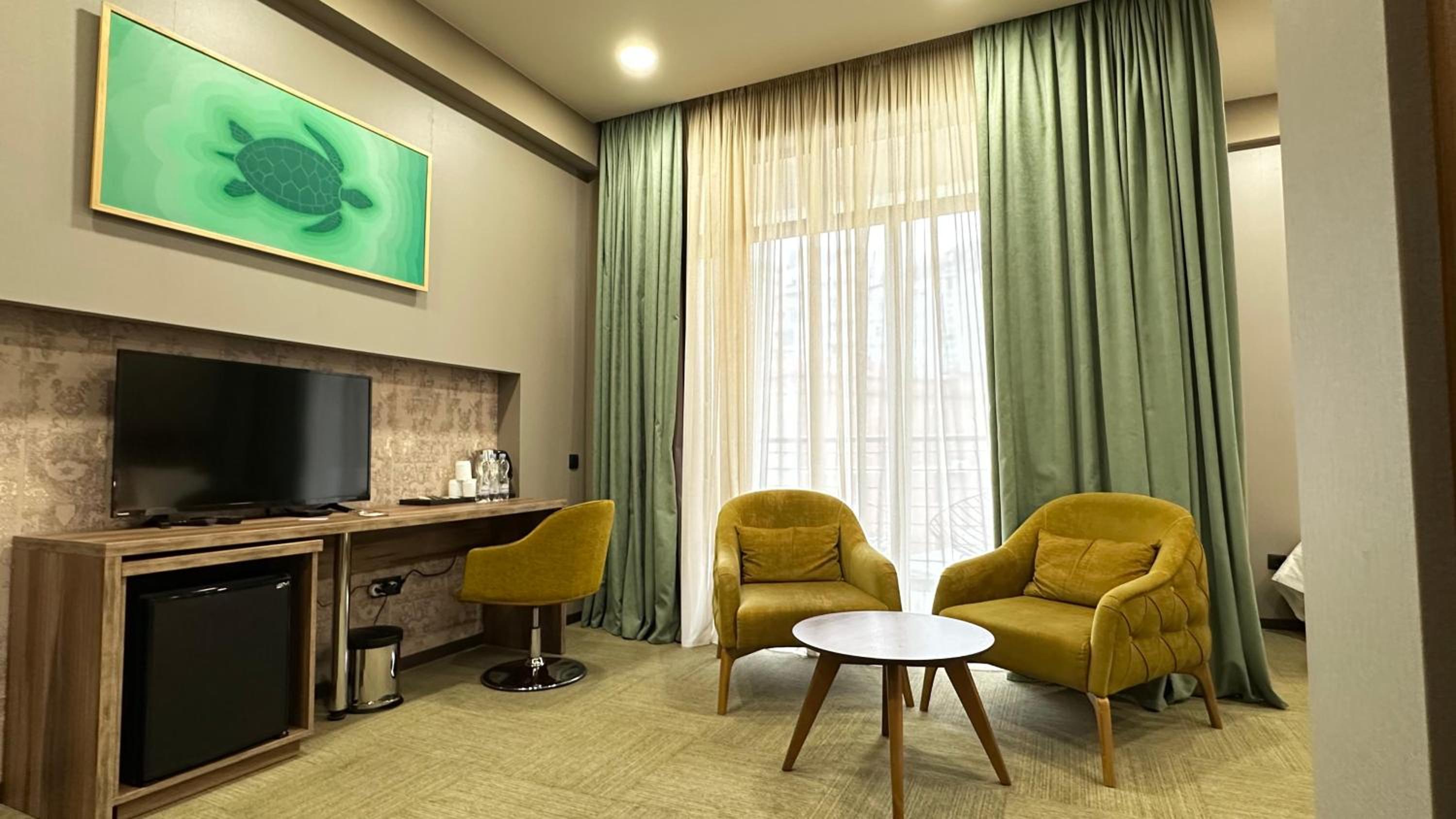 Superior Triple Room with Balcony and Garden View - Non-Smoking photo 2